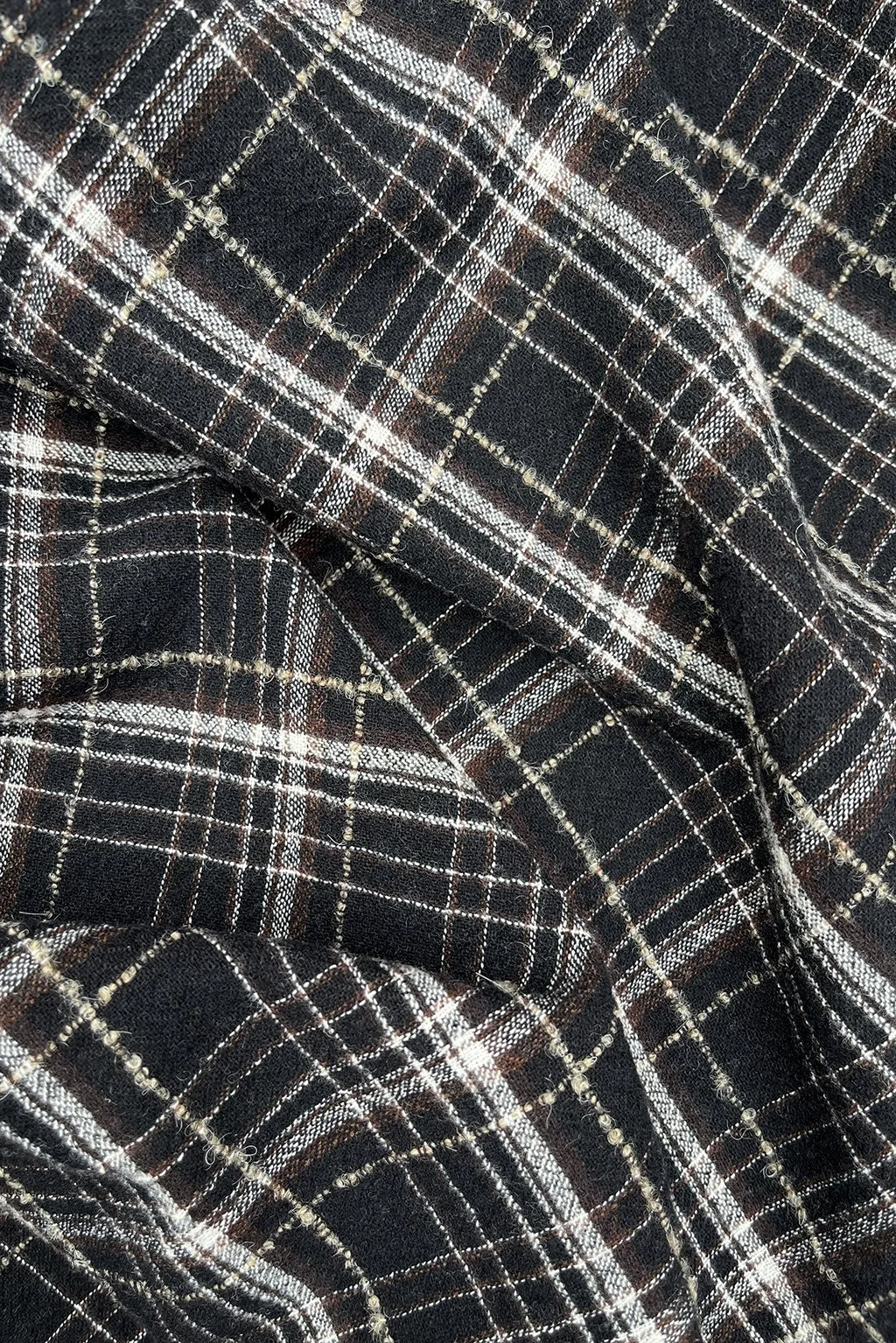 Italian plaid in black, white, beige and chestnut