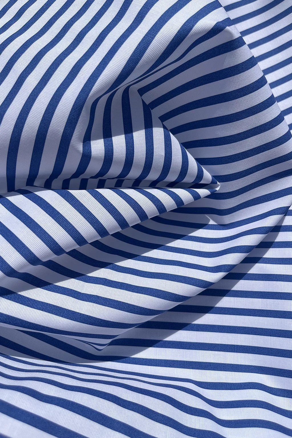 Cotton shirting in white and ocean blue stripe f.jpg