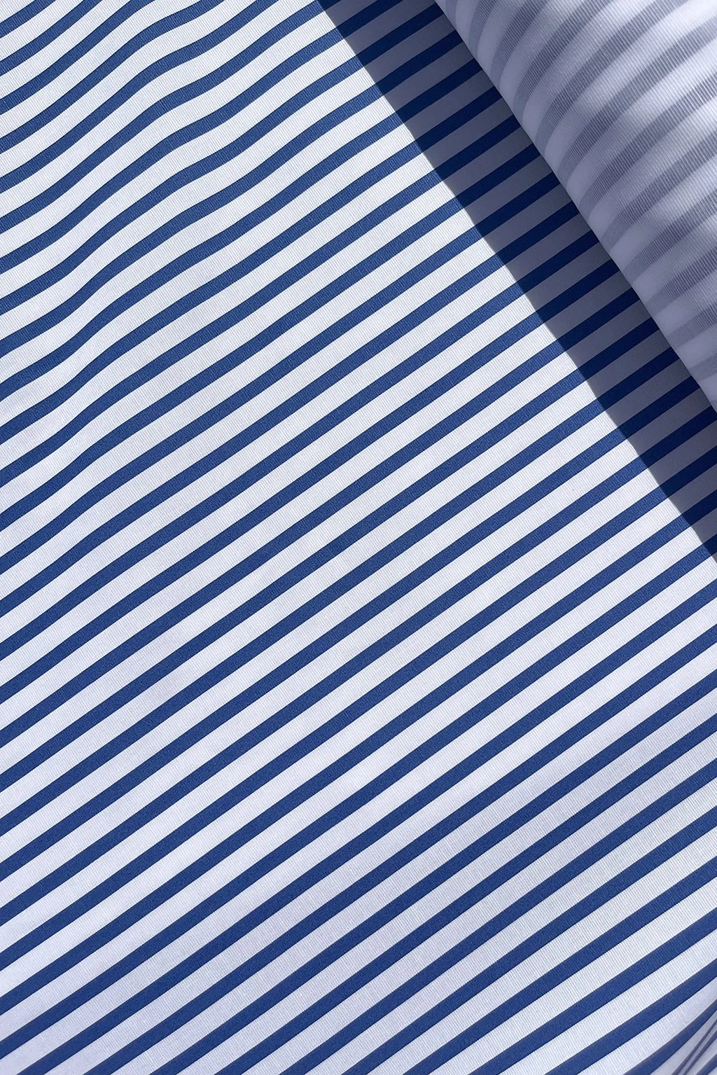 Cotton shirting in white and ocean blue stripe aaa.jpg