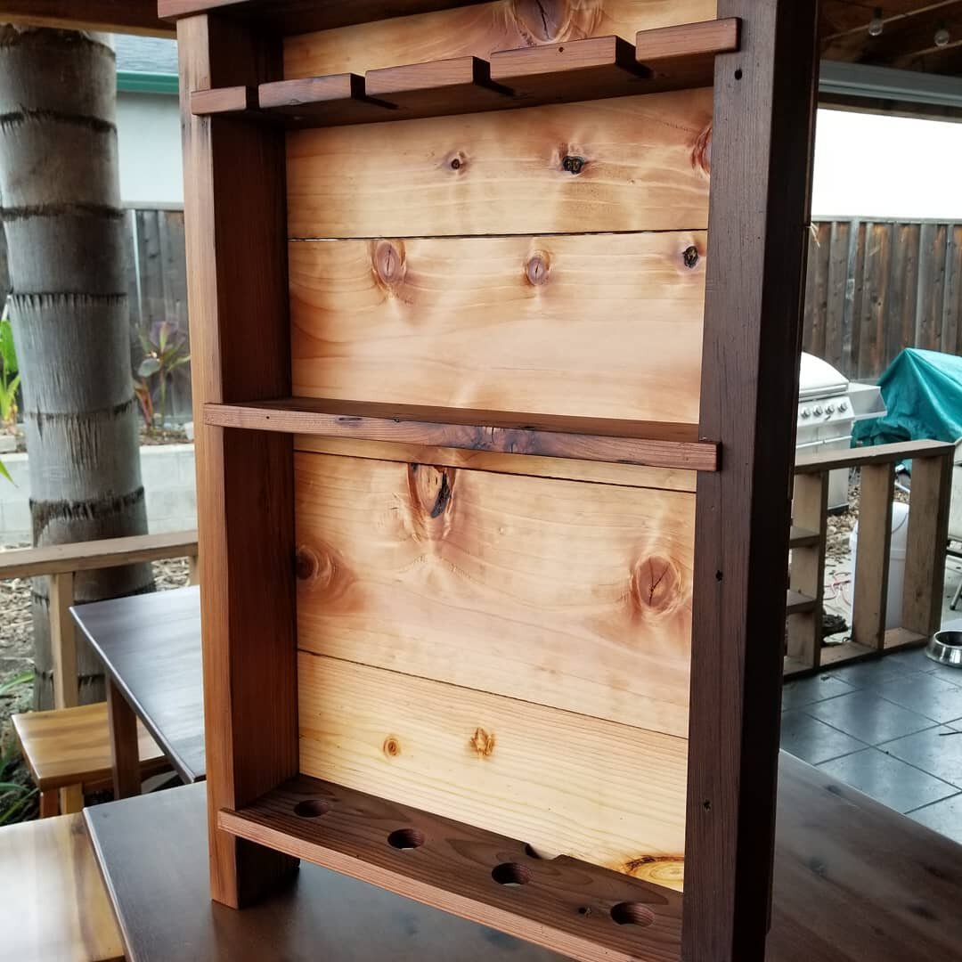 Here's a wine rack I made to sell a while back. My better half (supervisor) @evatorres_2000 decided she wanted it instead. 
The frame was made with 20+ year old redwood fence framing boards and the backing with new redwood fence boards. 
#Redwood #re