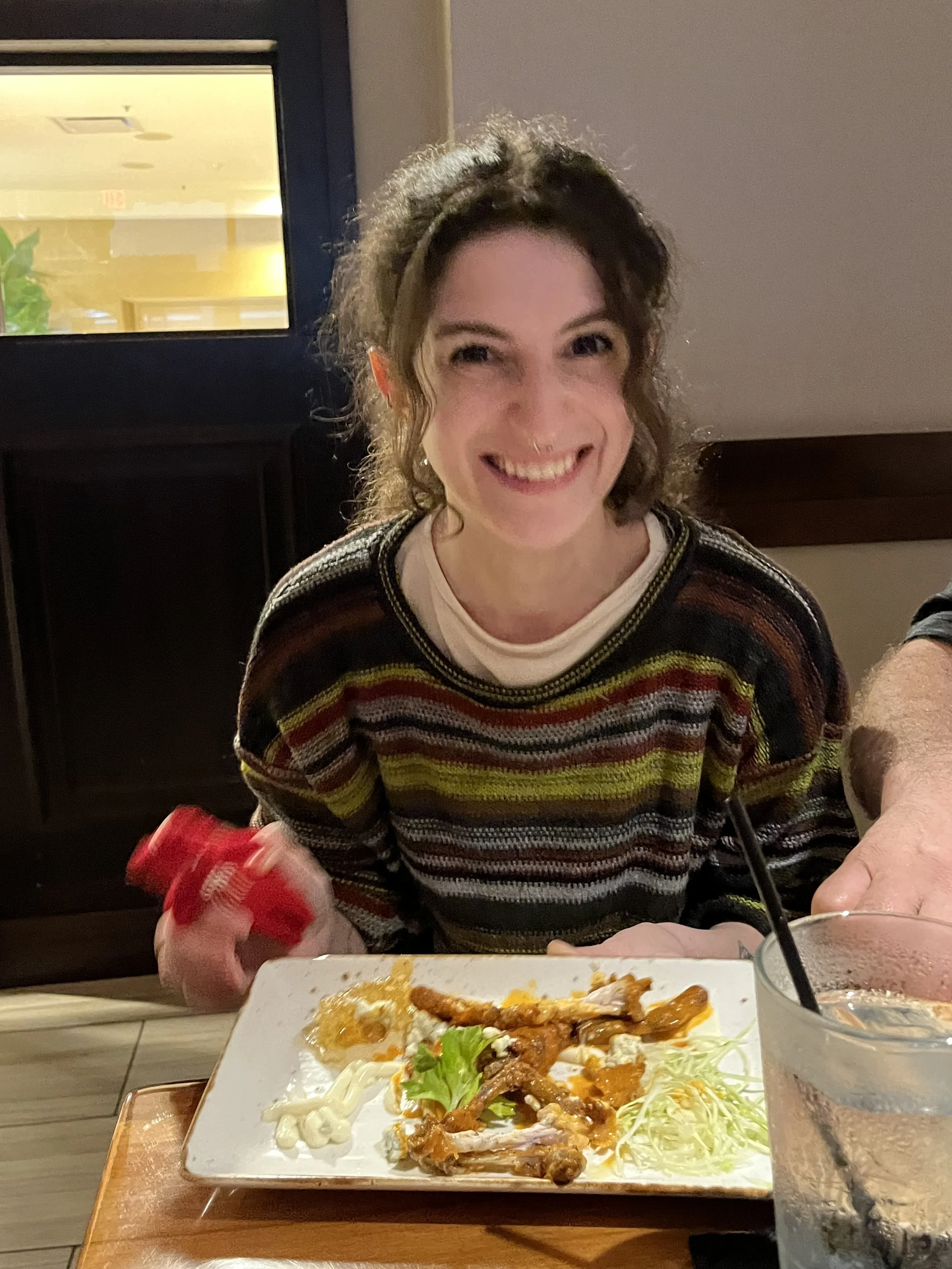 Frankie is so happy to be eating frog legs!