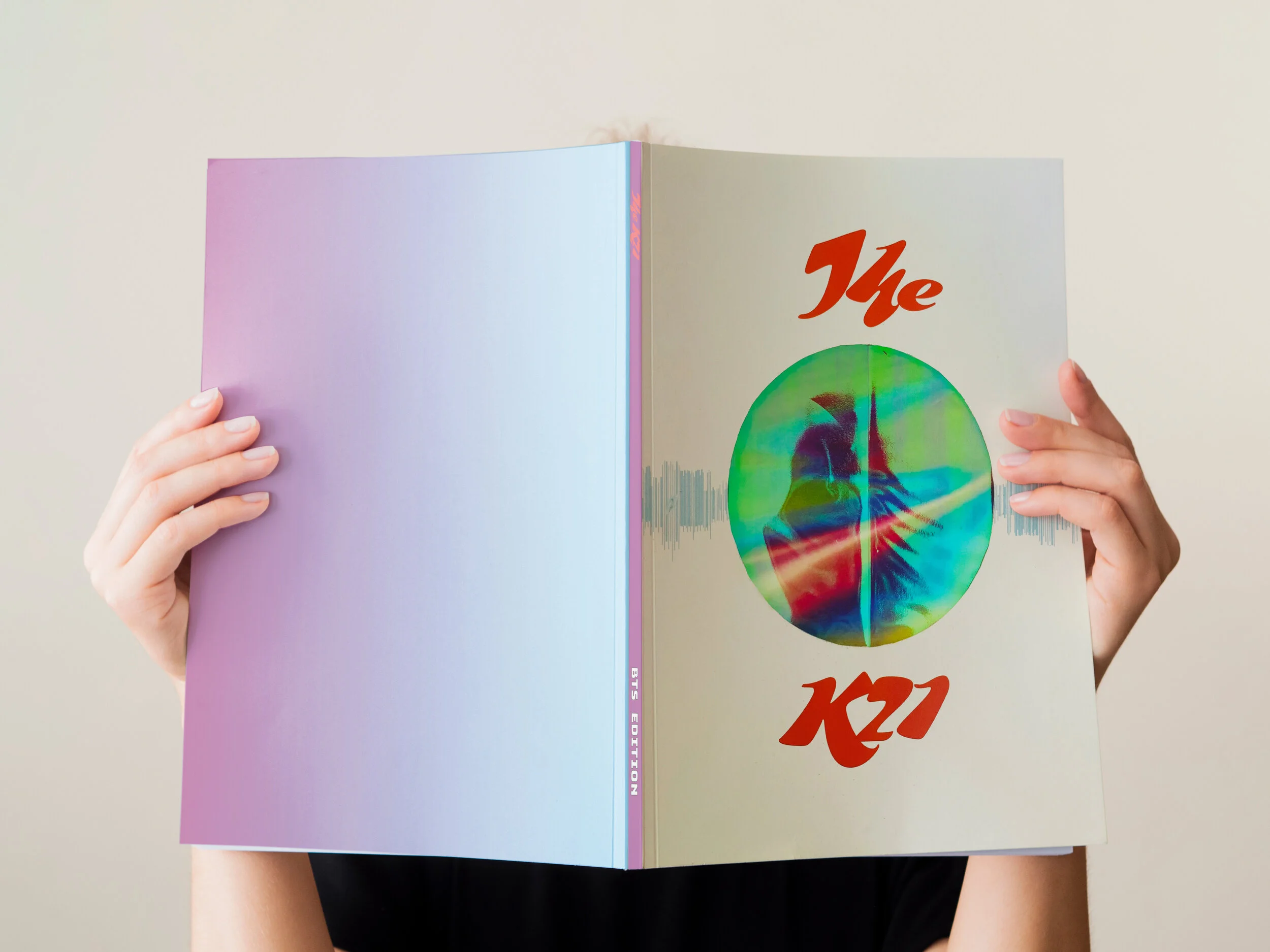 womanholdingmagazine.jpg