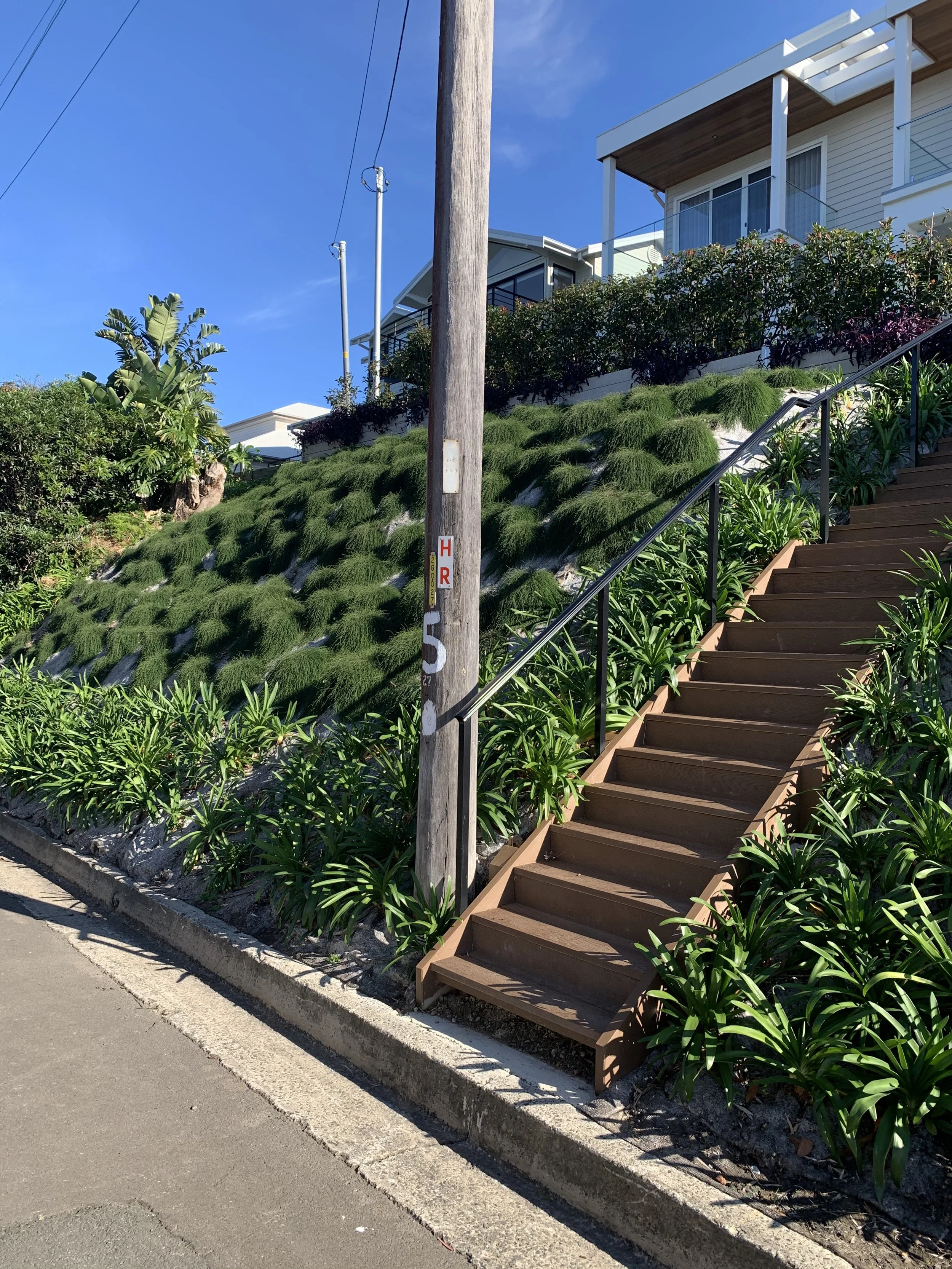 Sloped uneven block, front garden