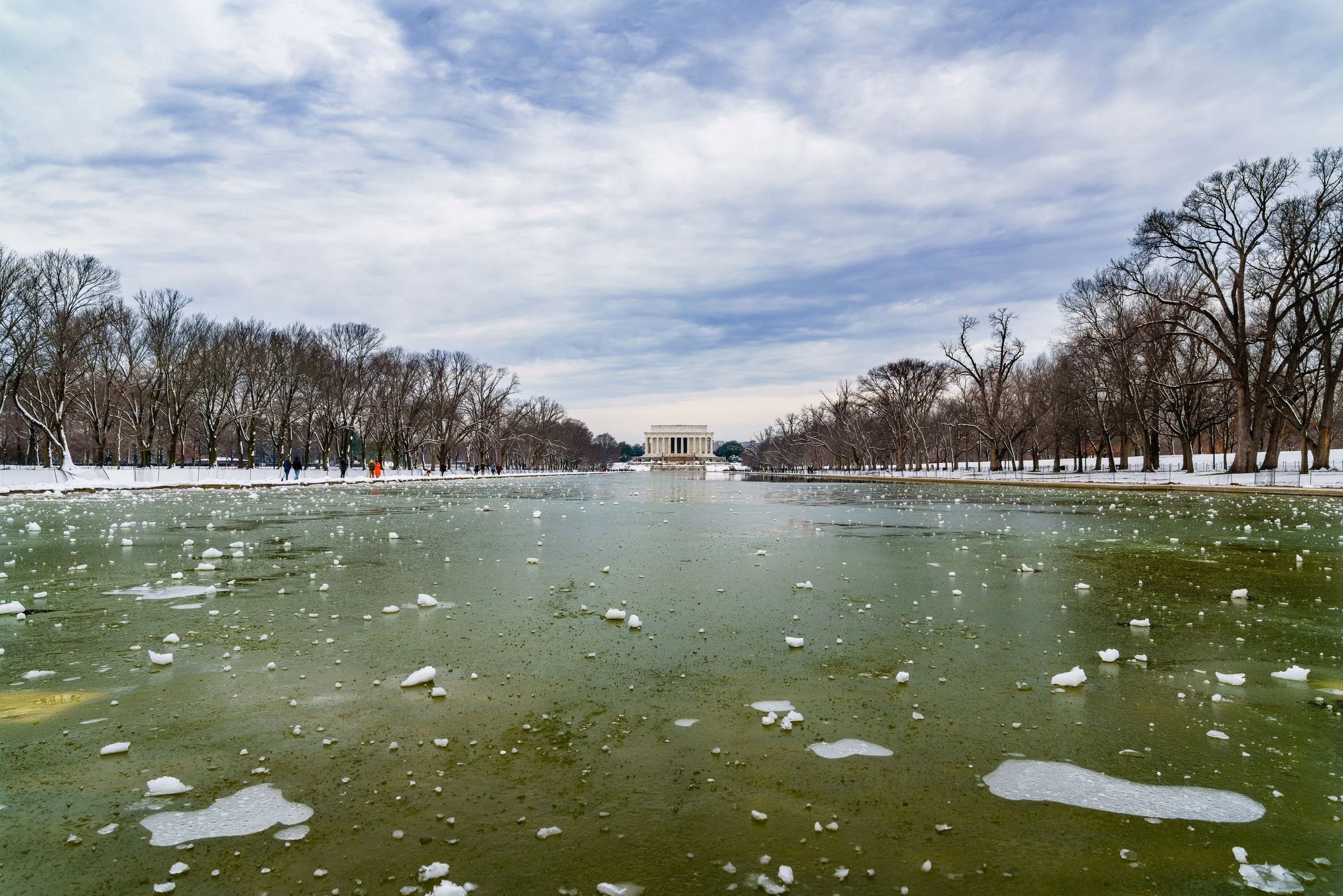 A shot of the Lincoln Memorial at the tip of the Lincoln Memorial Reflecting Pool frozen.  