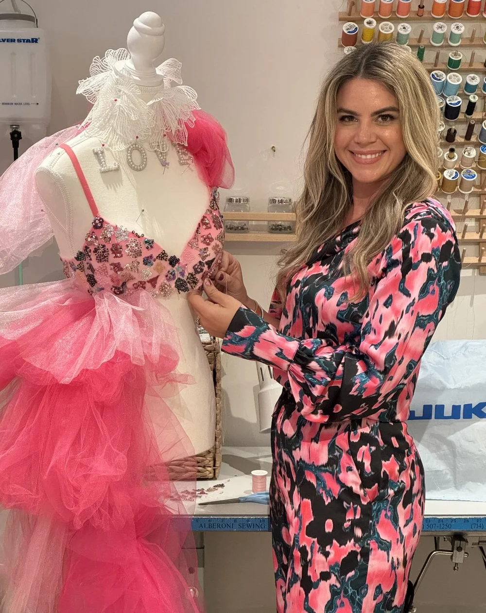 Amanda hand-finishing a couture piece