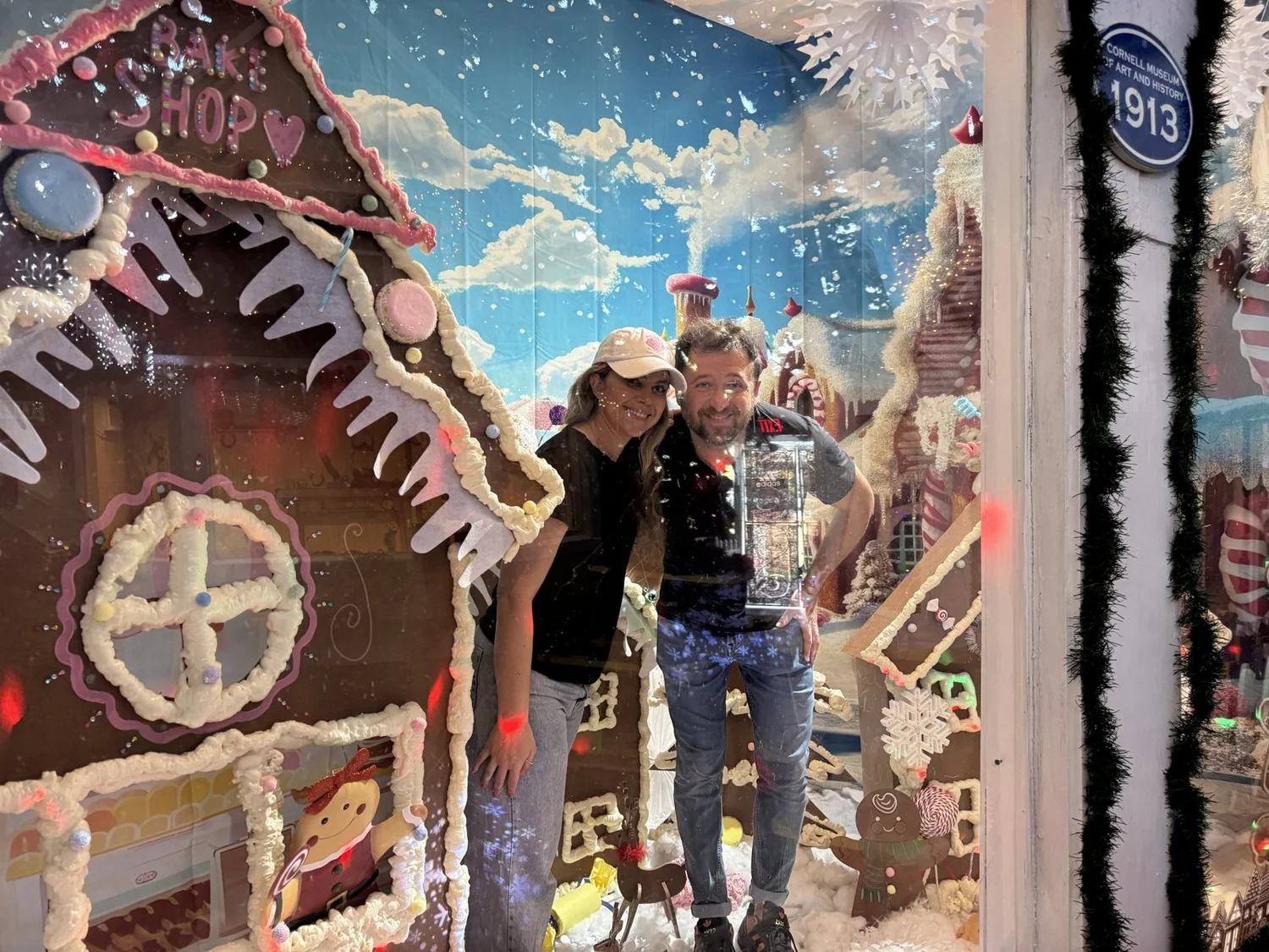 Gingerbread Village house hand-built by Amanda Perna inside the 100-foot tree