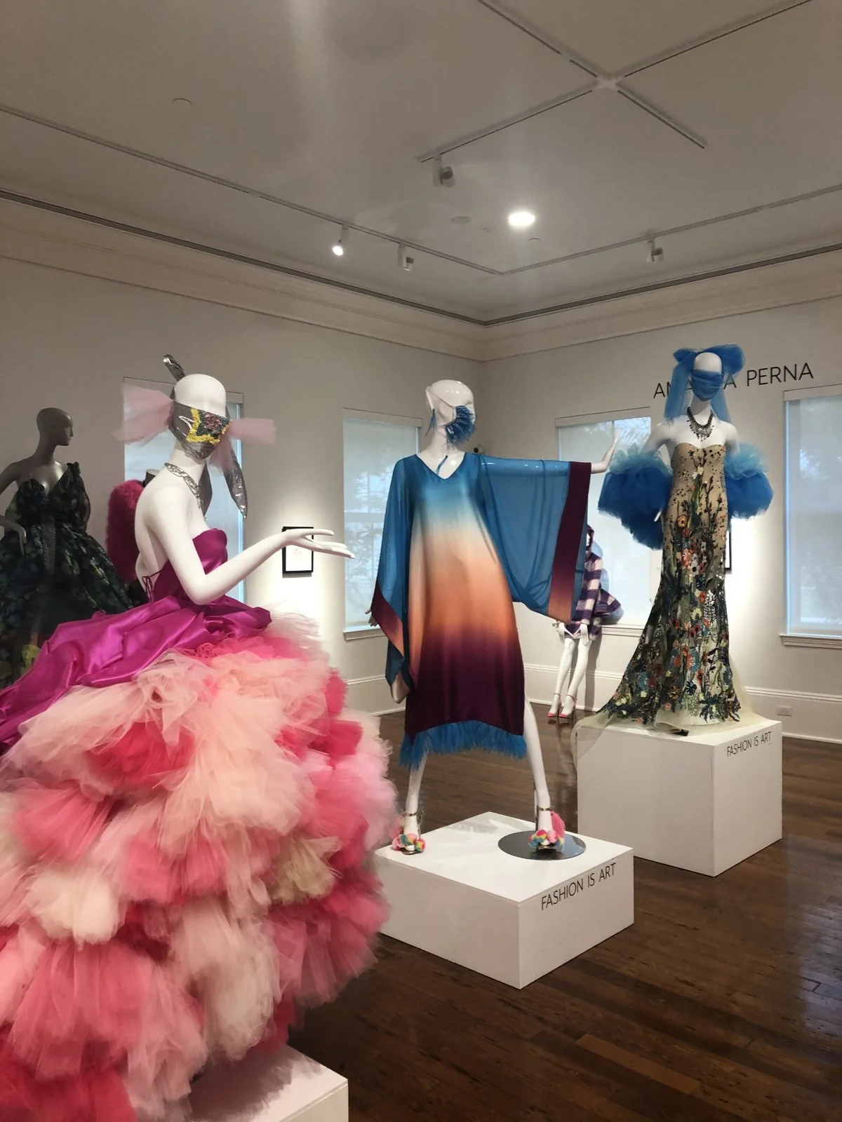 Gallery view of Amanda Perna's gowns at the Cornell Art Museum