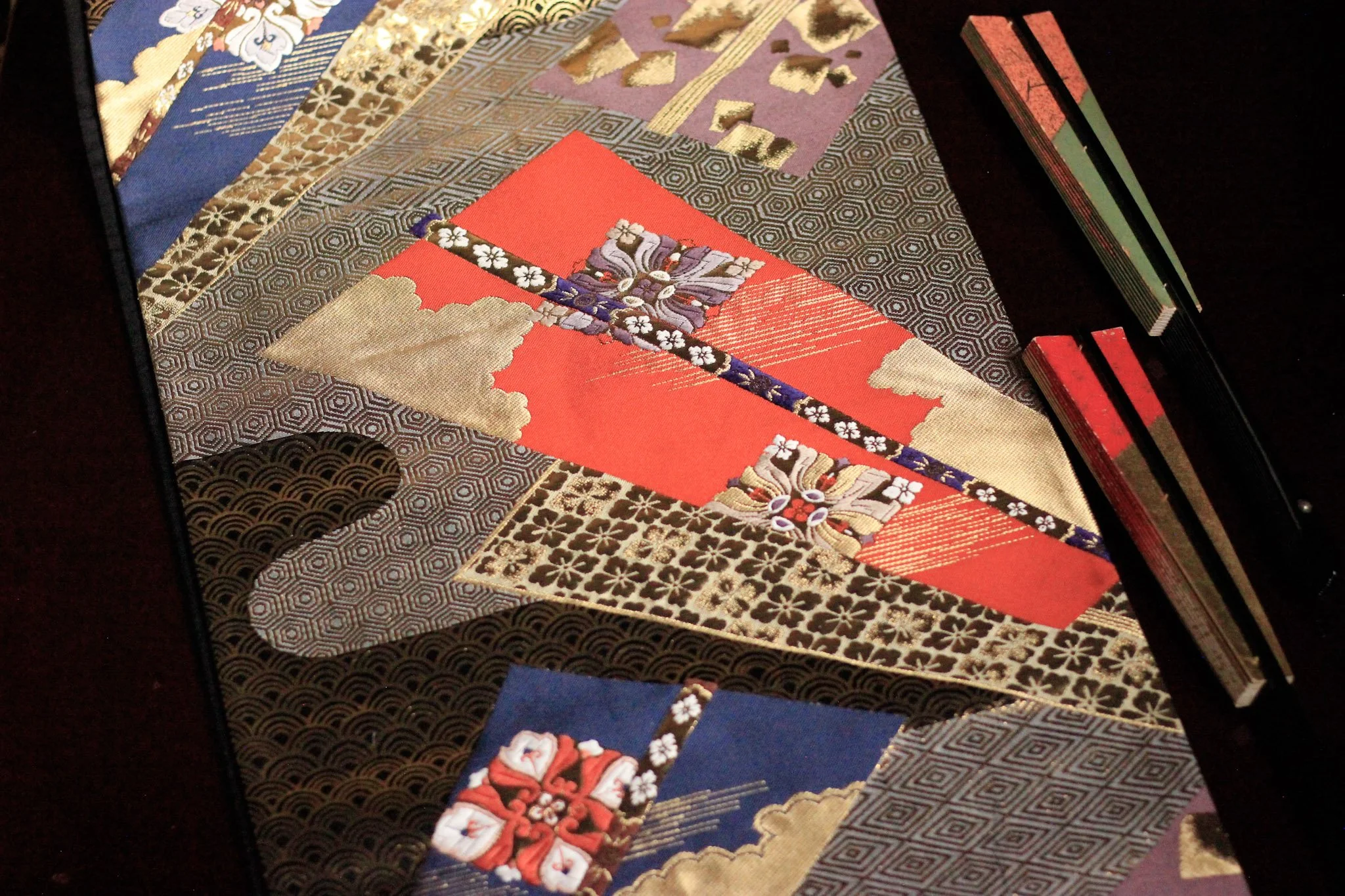 Vintage Japanese obi featuring the Sensu-chirashi (scattered folding fans) pattern.