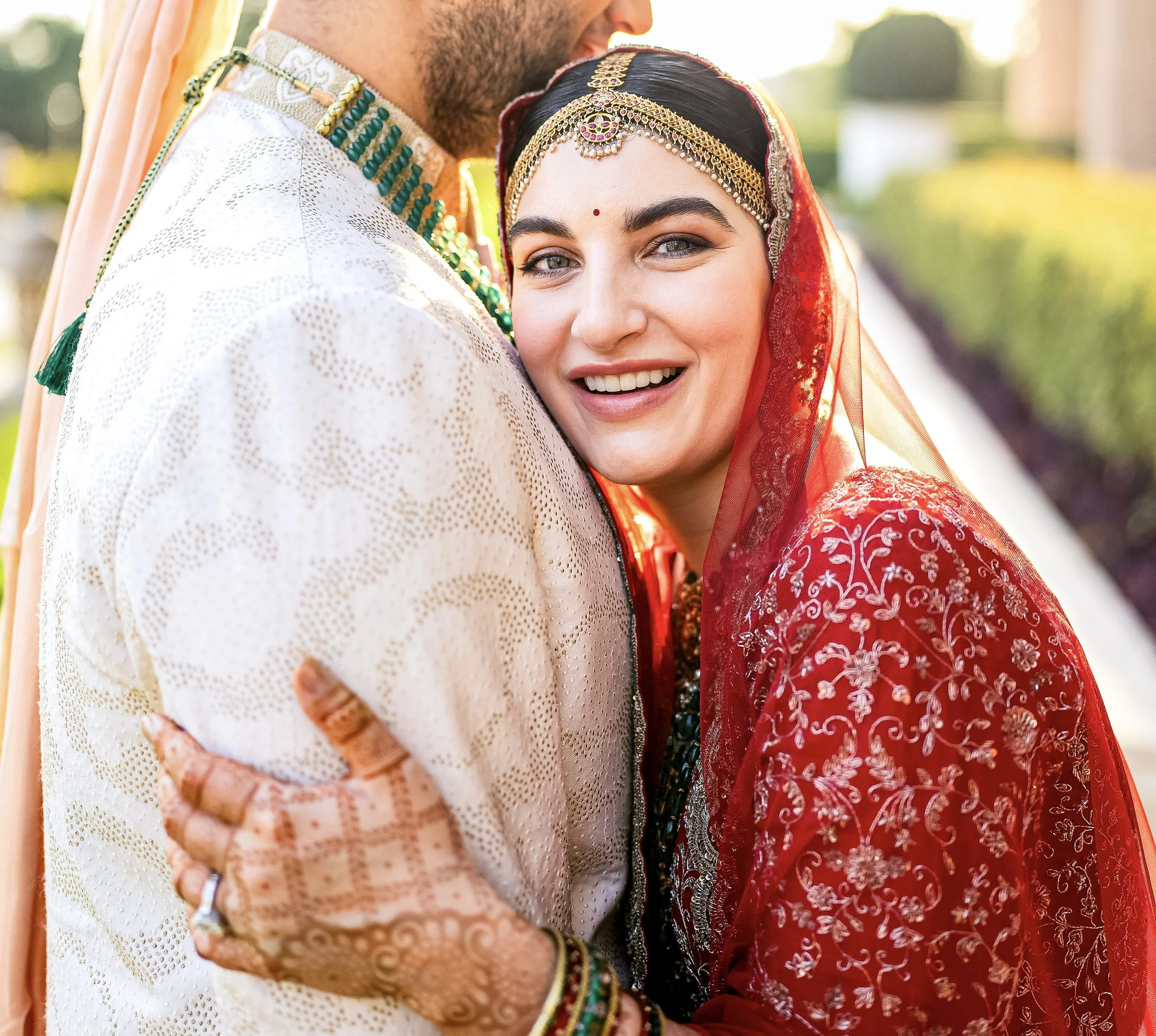 "I always smiled with my mouth closed because I didn't like how my teeth looked. For my wedding, I really wanted to smile in the photos for once. Dr. Prakash and the entire team changed my smile forever."