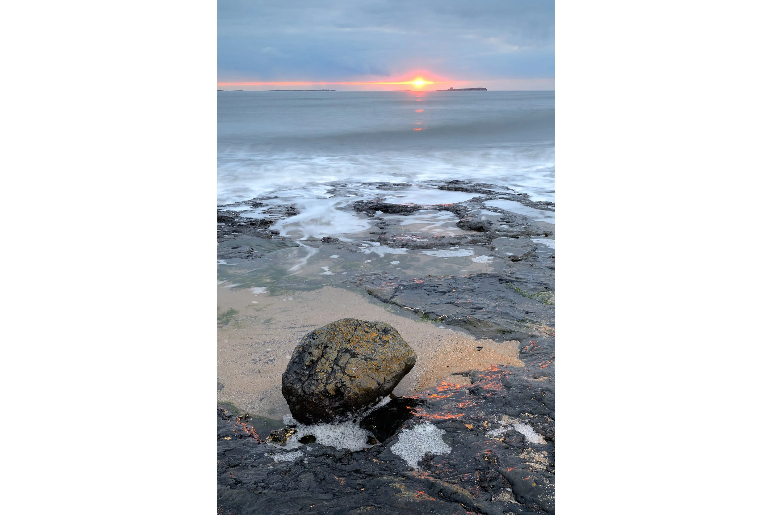 Sunrise at Bamburgh Beach - Harkness Rocks
