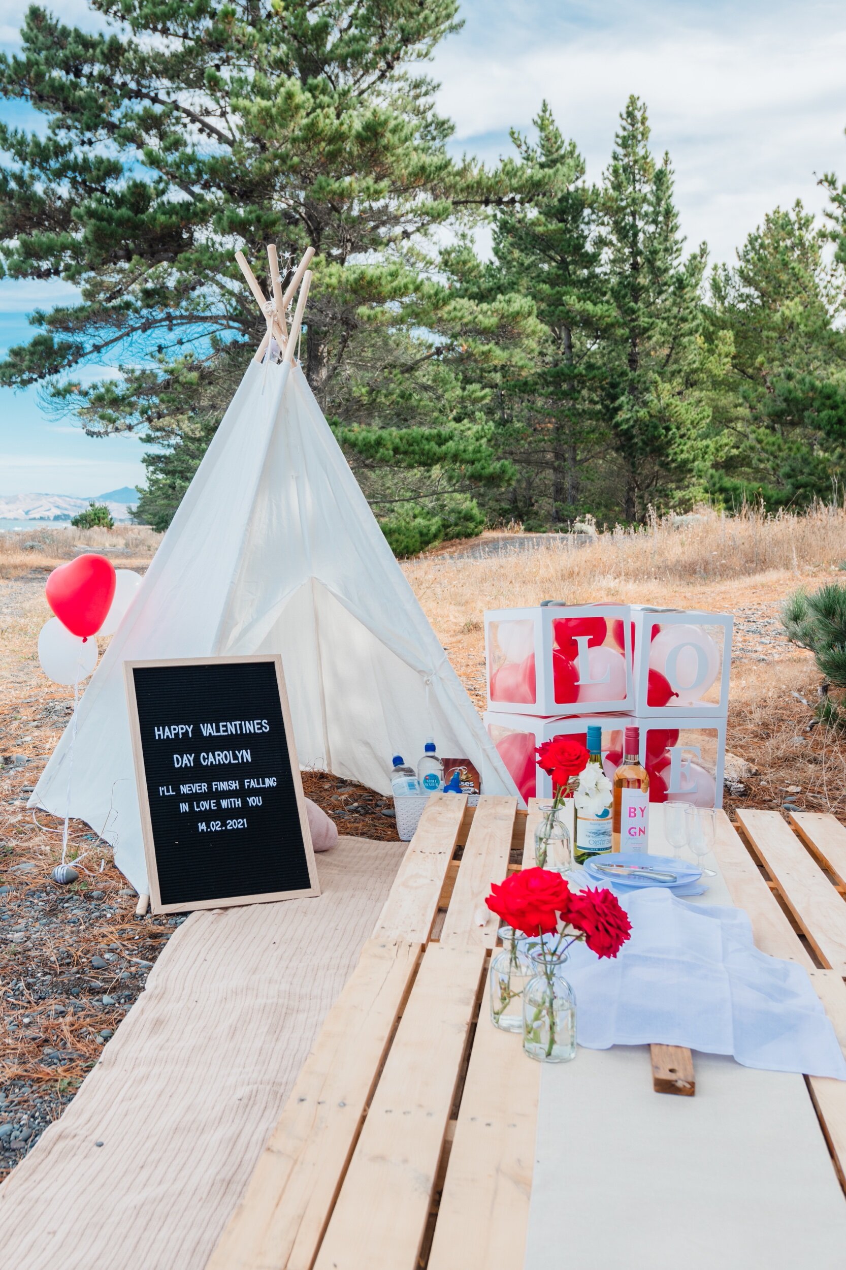 beach table with teepee surprise for partner