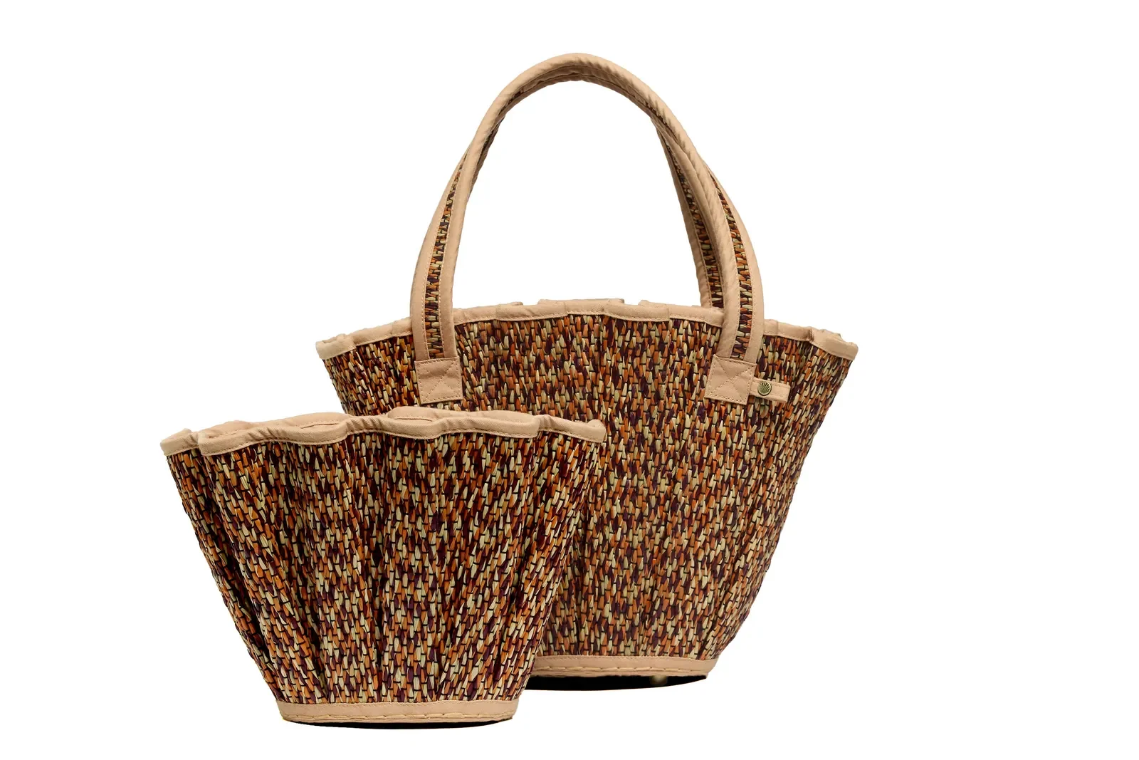 Angled front view of the Lorna Murray Dawn Mini Tropez Tote Bag showcasing its structured woven silhouette.