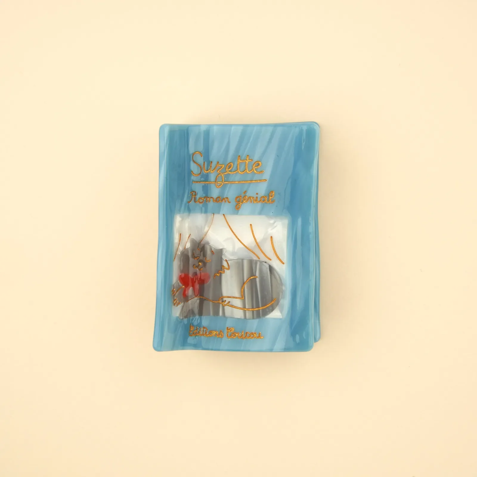 Coucou Suzette Novel Hair Claw in glossy cellulose acetate, a witty book-inspired French hair accessory curated by Goosebump.