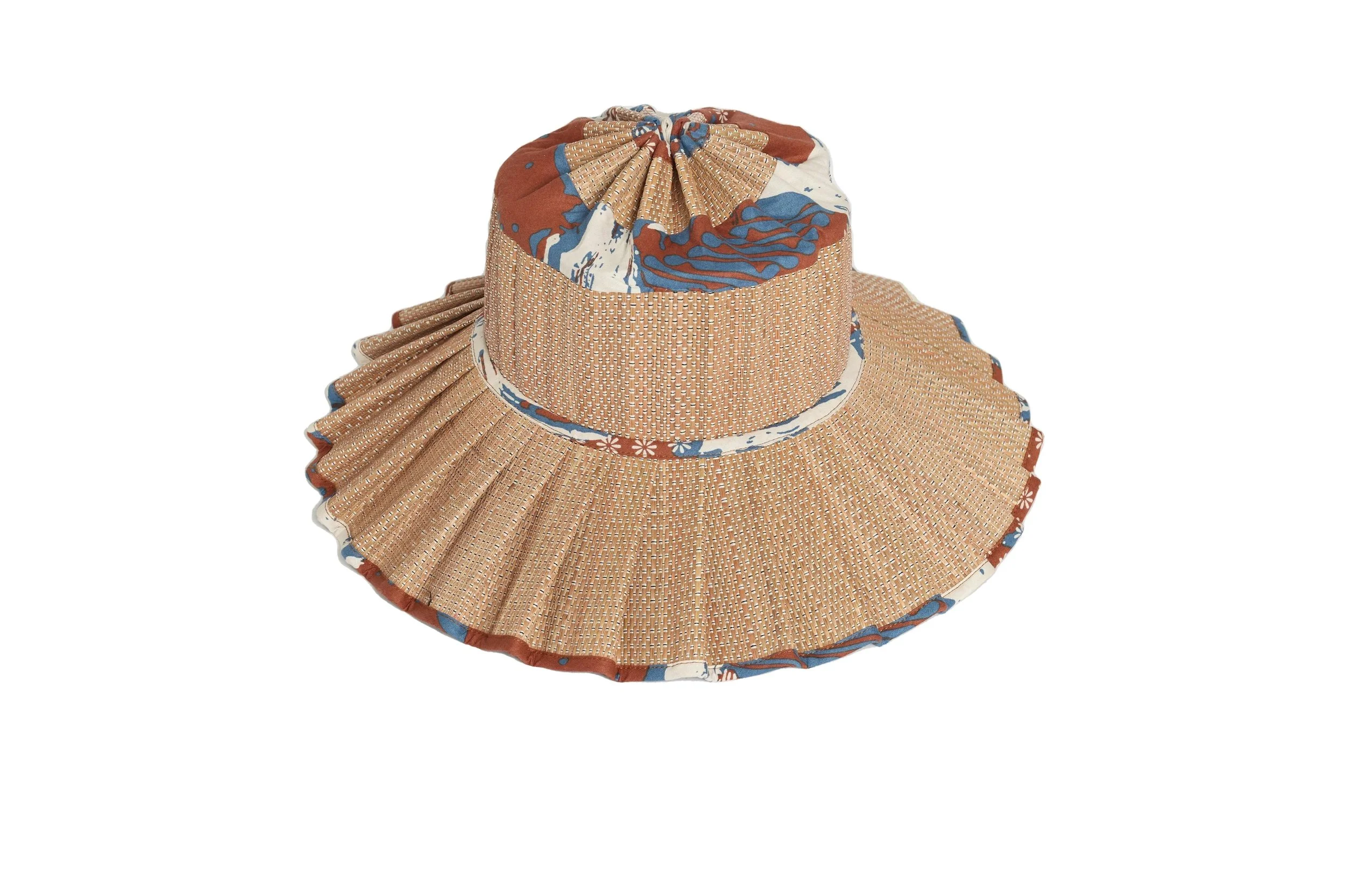 Coral Bay Island Capri Hat – handwoven foldable wide-brim sun hat in coral and neutral tones, available at Goosebump Hong Kong.