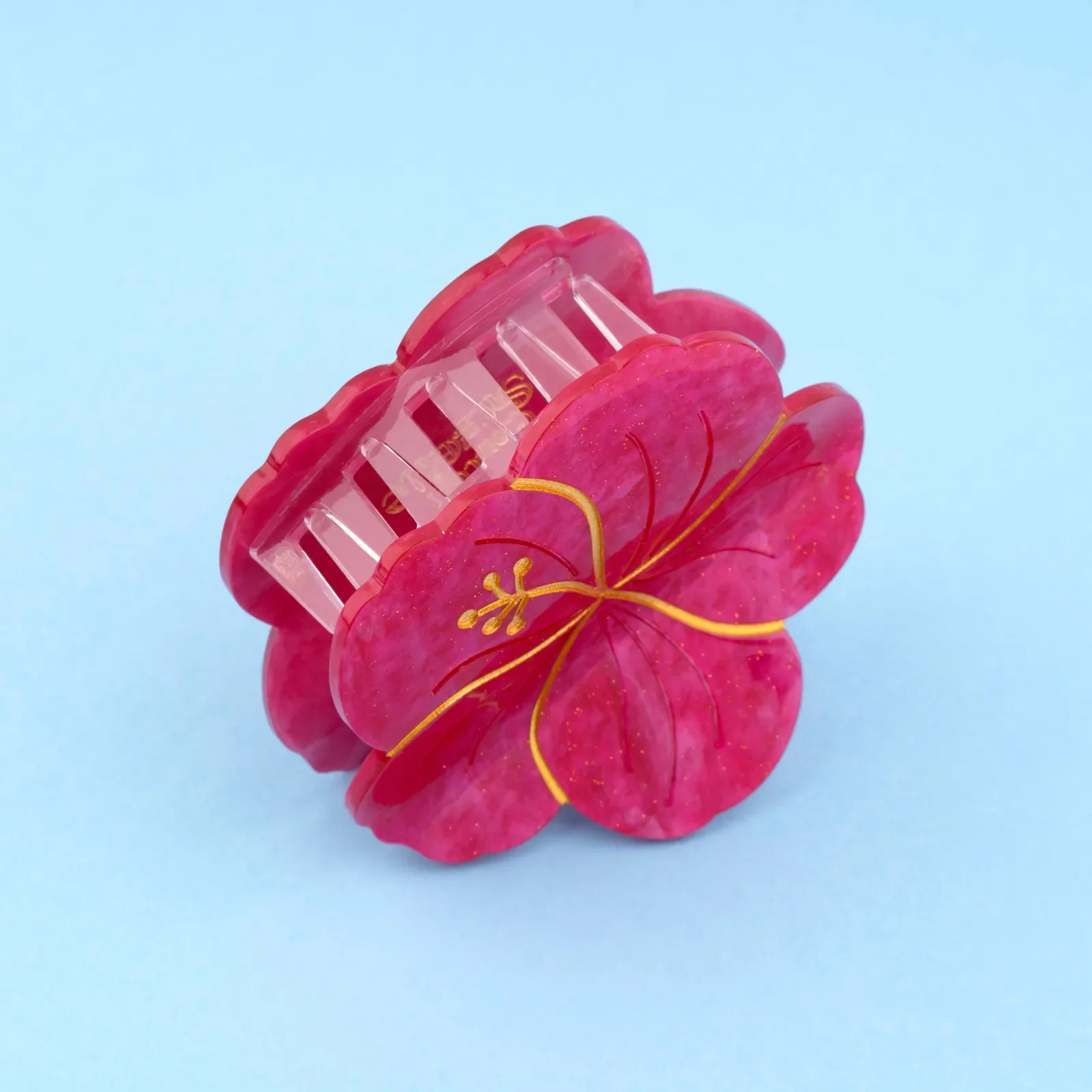 Coucou Suzette Hibiscus Hair Claw in glossy cellulose acetate, a colourful French flower hair accessory curated by Goosebump.