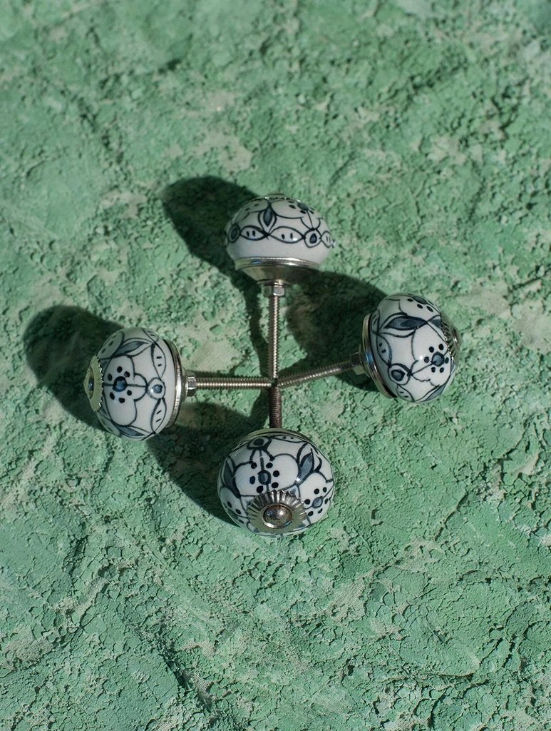 BluePotteryDoorKnobs-Black_WhiteFloral_Setof4_-BPICH6A1_1024x1024.jpeg