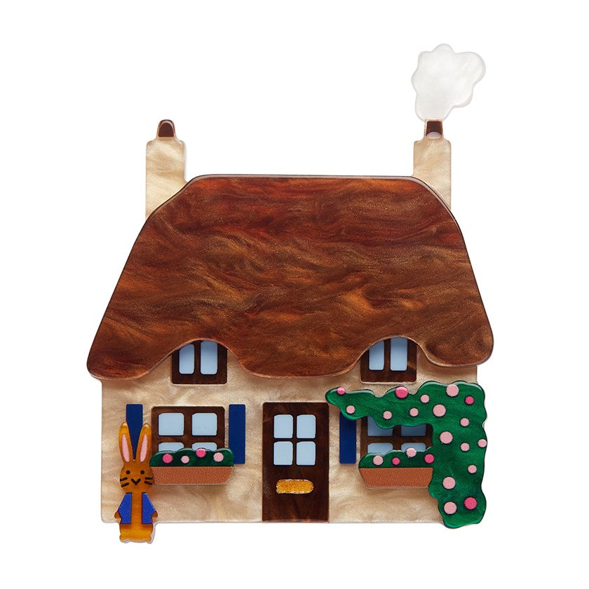 Country Cottage Brooch featuring a textured thatched roof, floral garden details, and cozy English cottage vibes – a handmade accessory perfect for countryside enthusiasts and Erstwilder collectors.