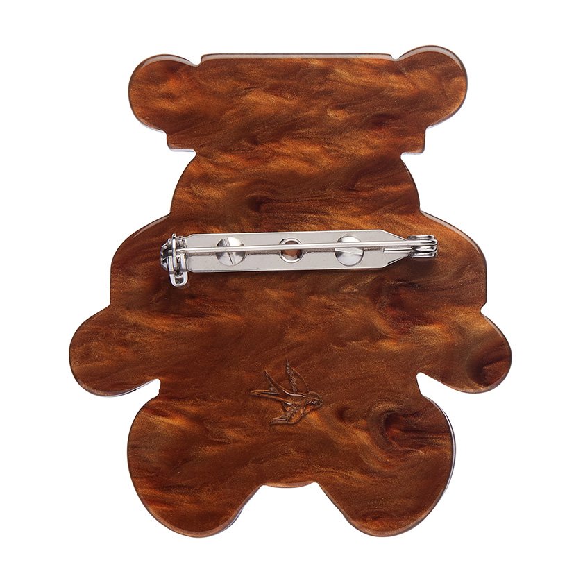 A charming Teddy Yeoman brooch featuring a layered red, gold, and brown resin design in an iconic Beefeater uniform, perfect for fans of British history.