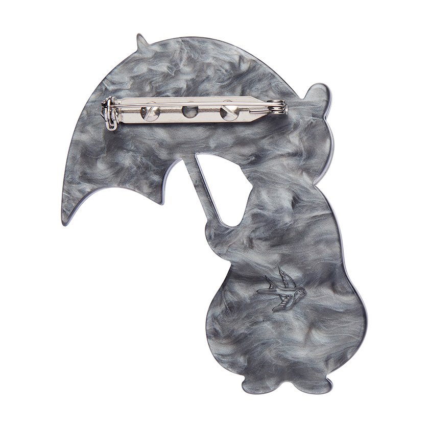 Bill the Badger Brooch featuring marbled resins in black, grey, and green with a whimsical design of a badger holding a green umbrella. Perfect for Anglophiles and Erstwilder collectors.
