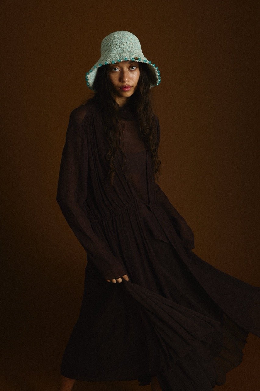 Earth Age Luminescence crocheted hat showing its beaded brim and handmade texture