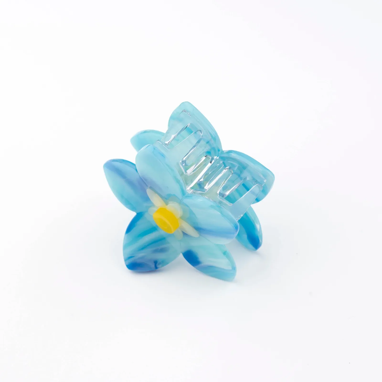 Coucou Suzette Forget-Me-Not Hair Claw in glossy cellulose acetate, a delicate French flower hair accessory curated by Goosebump.