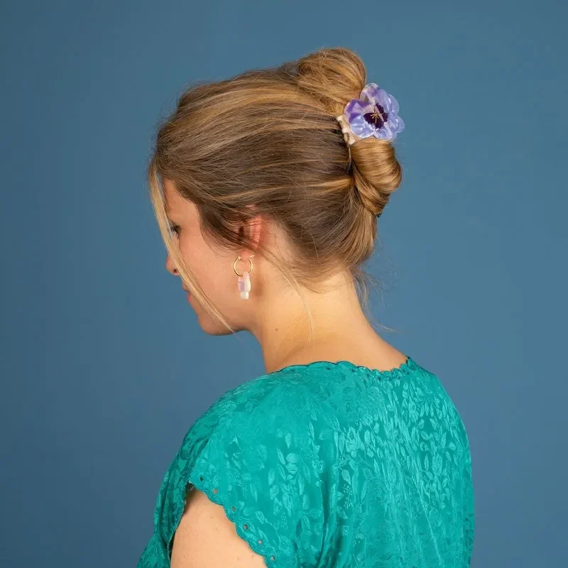 Coucou Suzette Pansy Hair Claw in glossy cellulose acetate, a delicate French flower hair accessory curated by Goosebump.