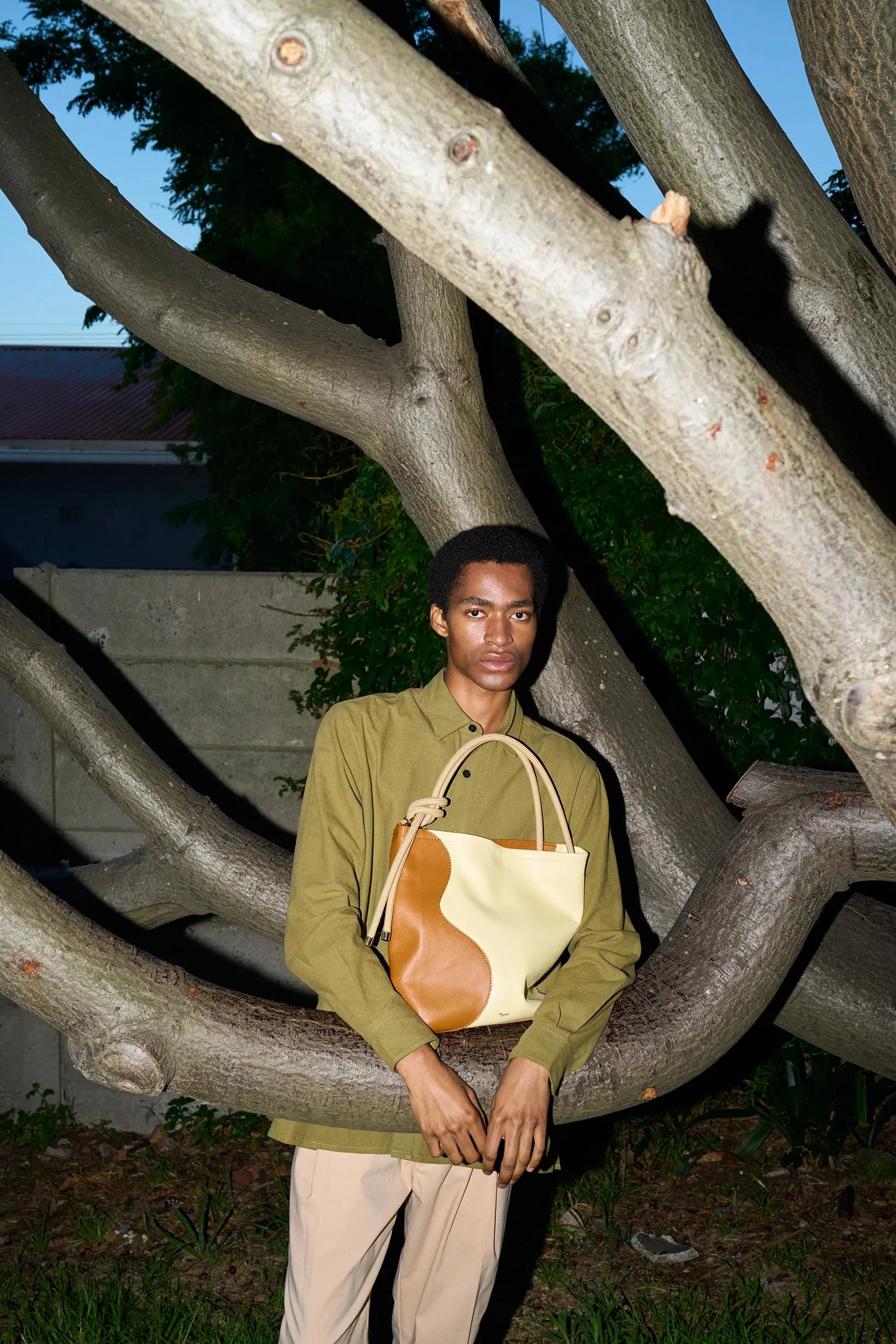 Tan and butter ripple canvas tote bag by Project Dyad, handmade with sculptural folds and cotton straps.