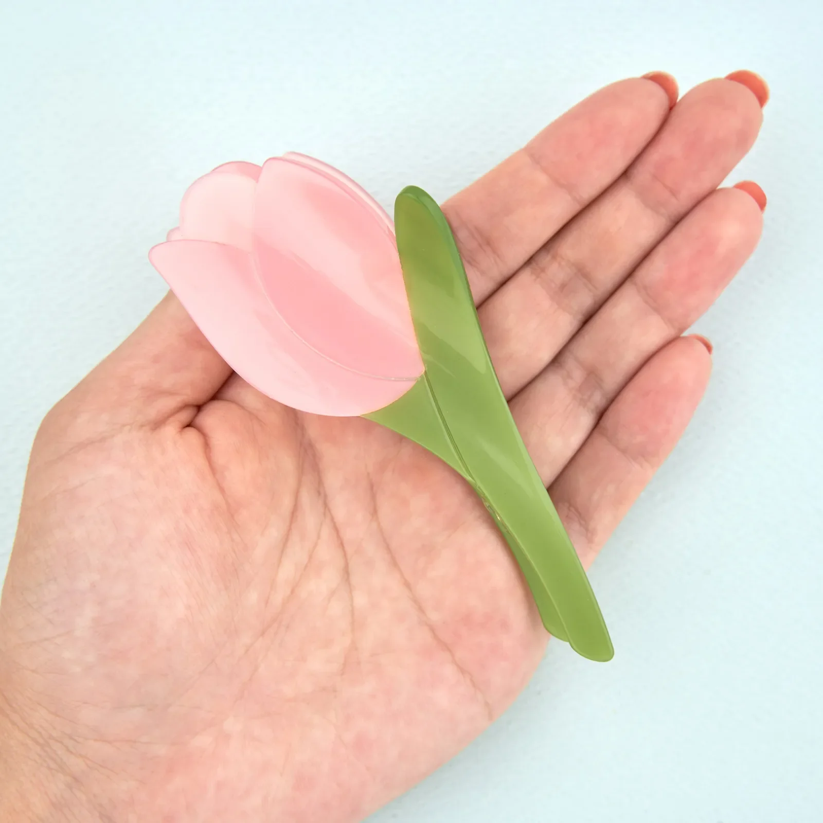 Coucou Suzette Tulip Hair Claw in glossy cellulose acetate, an elegant French flower hair accessory curated by Goosebump.