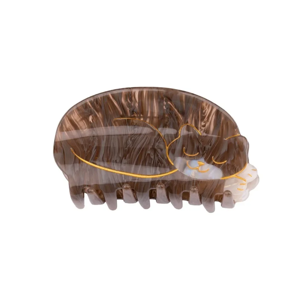 Sleeping cat hair claw by Coucou Suzette in glossy cellulose acetate.