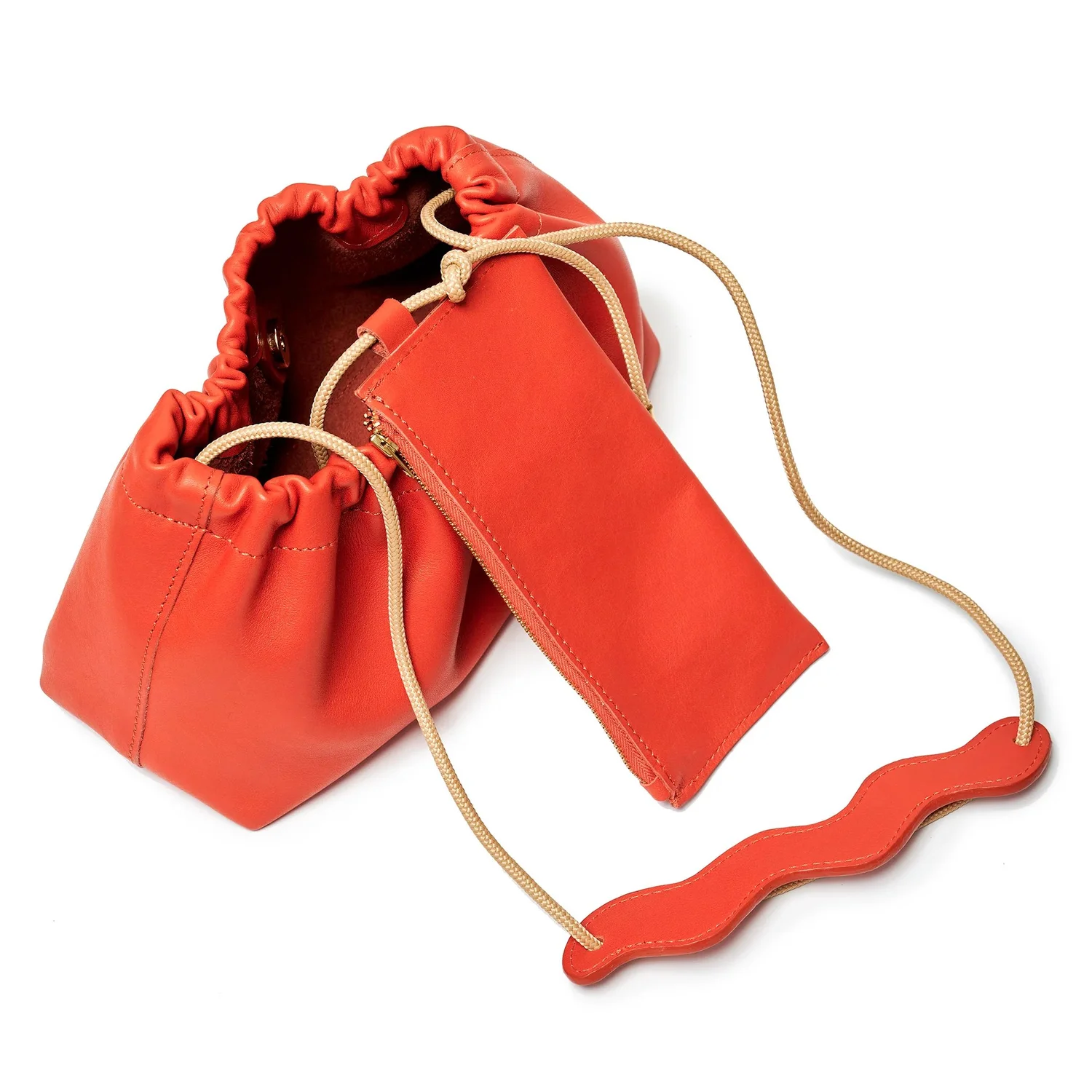 Project Dyad Lobster Red Wave Bag shown from a second sculptural angle