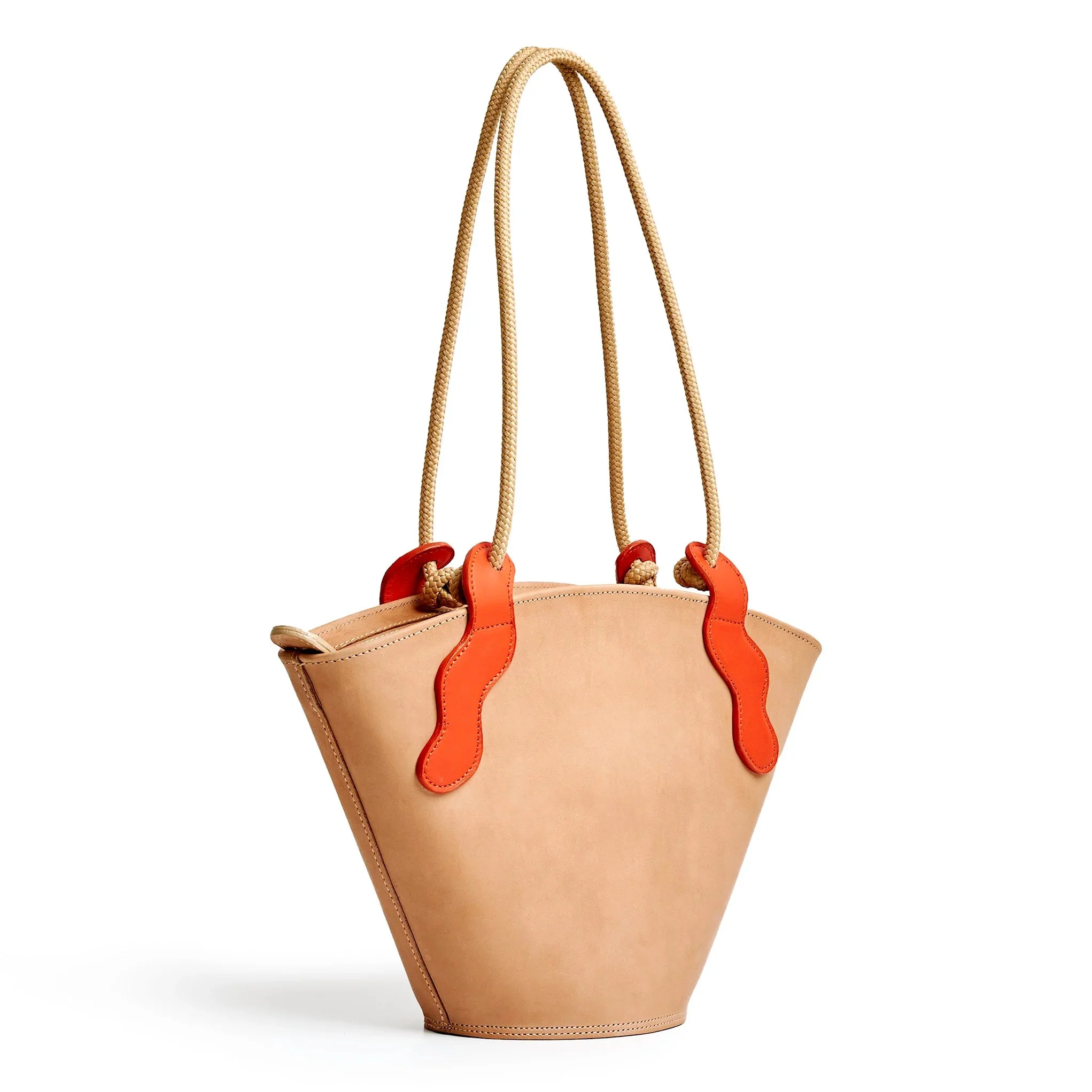 Almond and lobster red Emele Bag by Project Dyad, handmade in Cape Town with a curved silhouette and structured pleats.