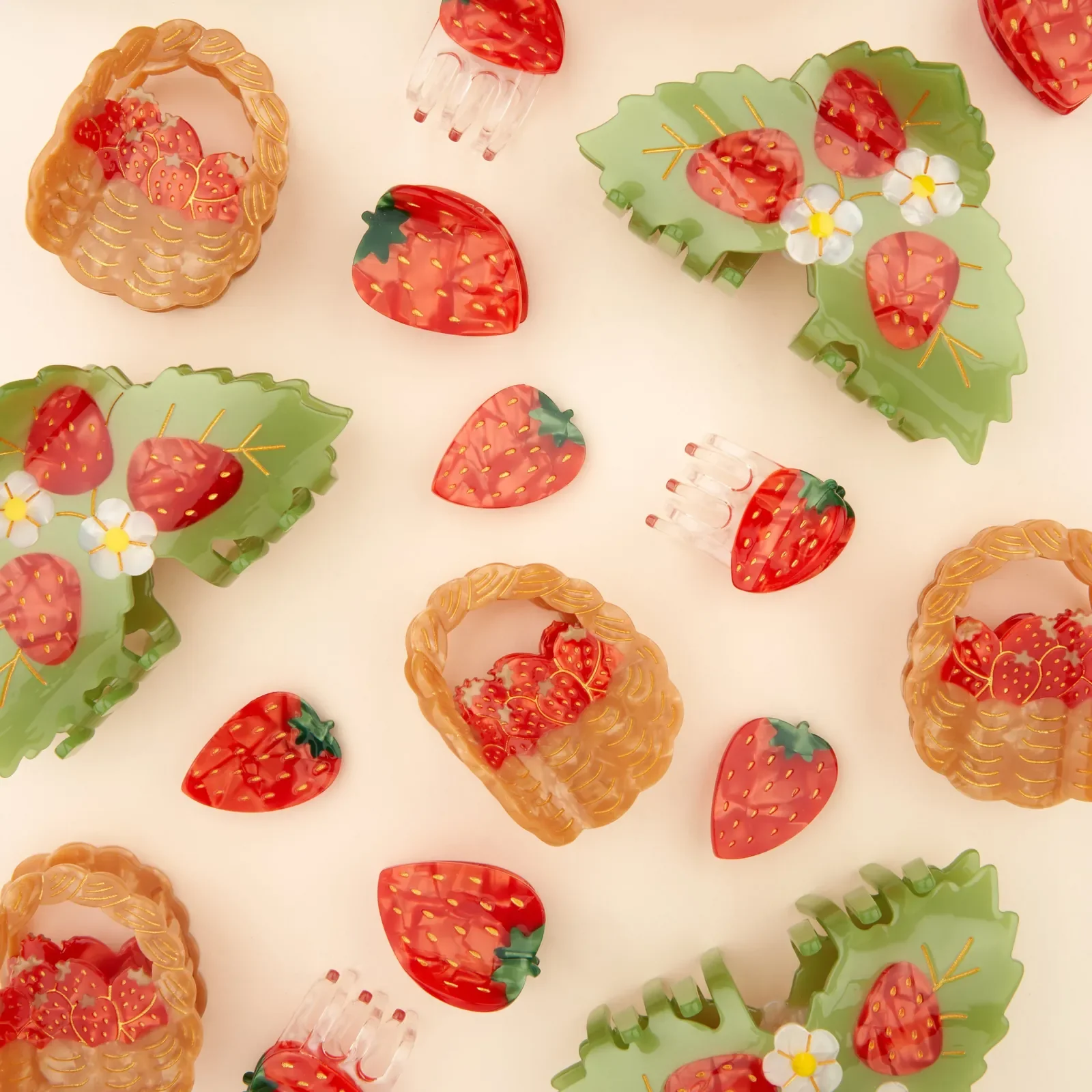 Coucou Suzette Strawberry Barrette in glossy cellulose acetate, a playful French fruit-inspired hair clip curated by Goosebump.