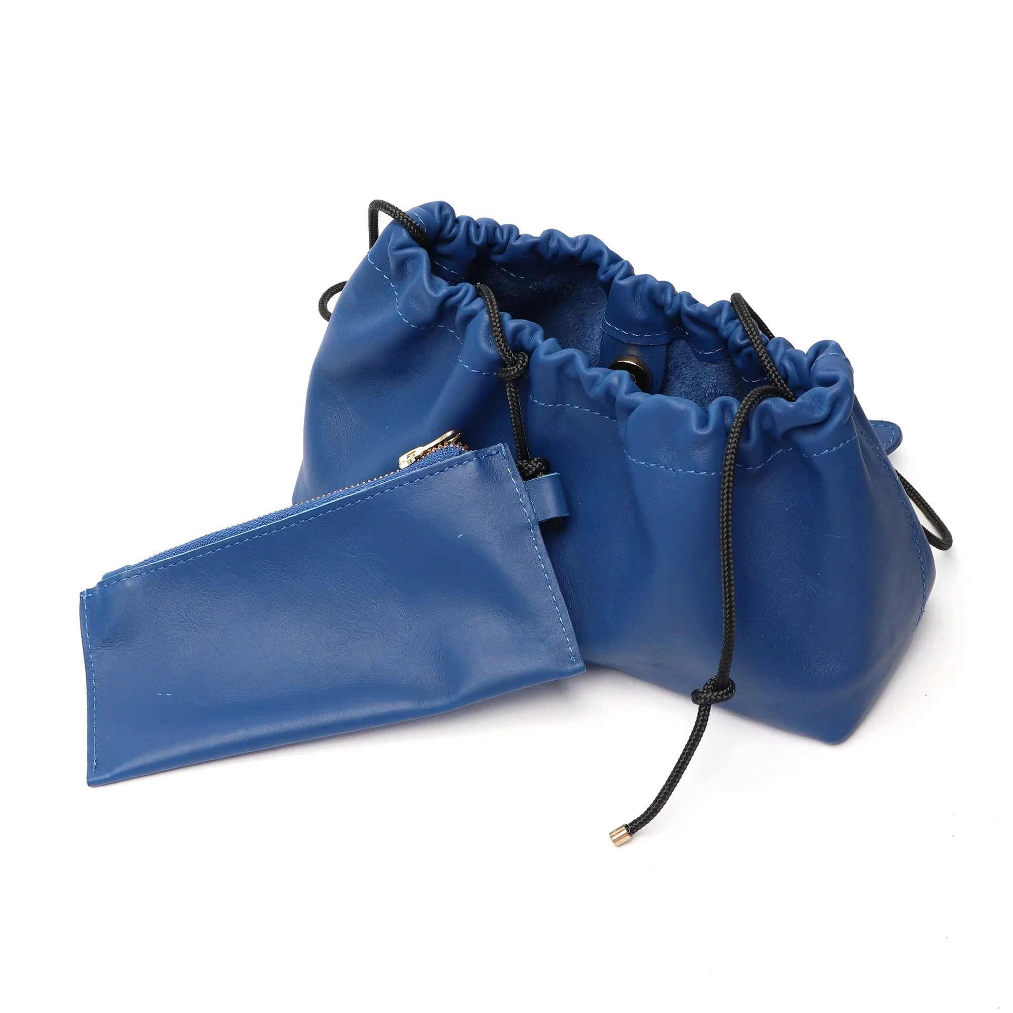 Wave Bag in cobalt blue canvas with sculptural folded silhouette, handmade in Cape Town by Project Dyad.