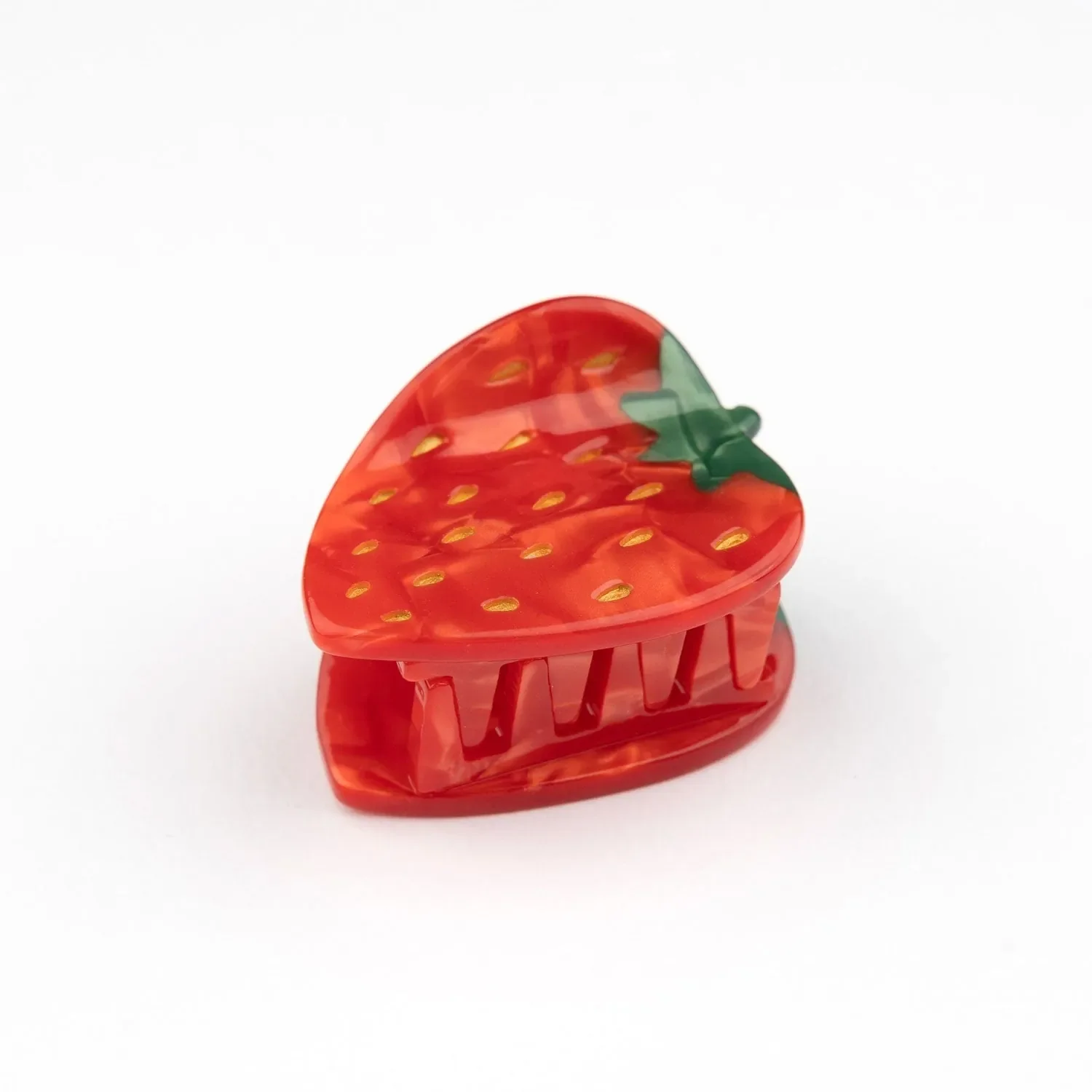 Coucou Suzette Strawberry Hair Claw in glossy cellulose acetate, a playful French fruit-inspired hair accessory curated by Goosebump.