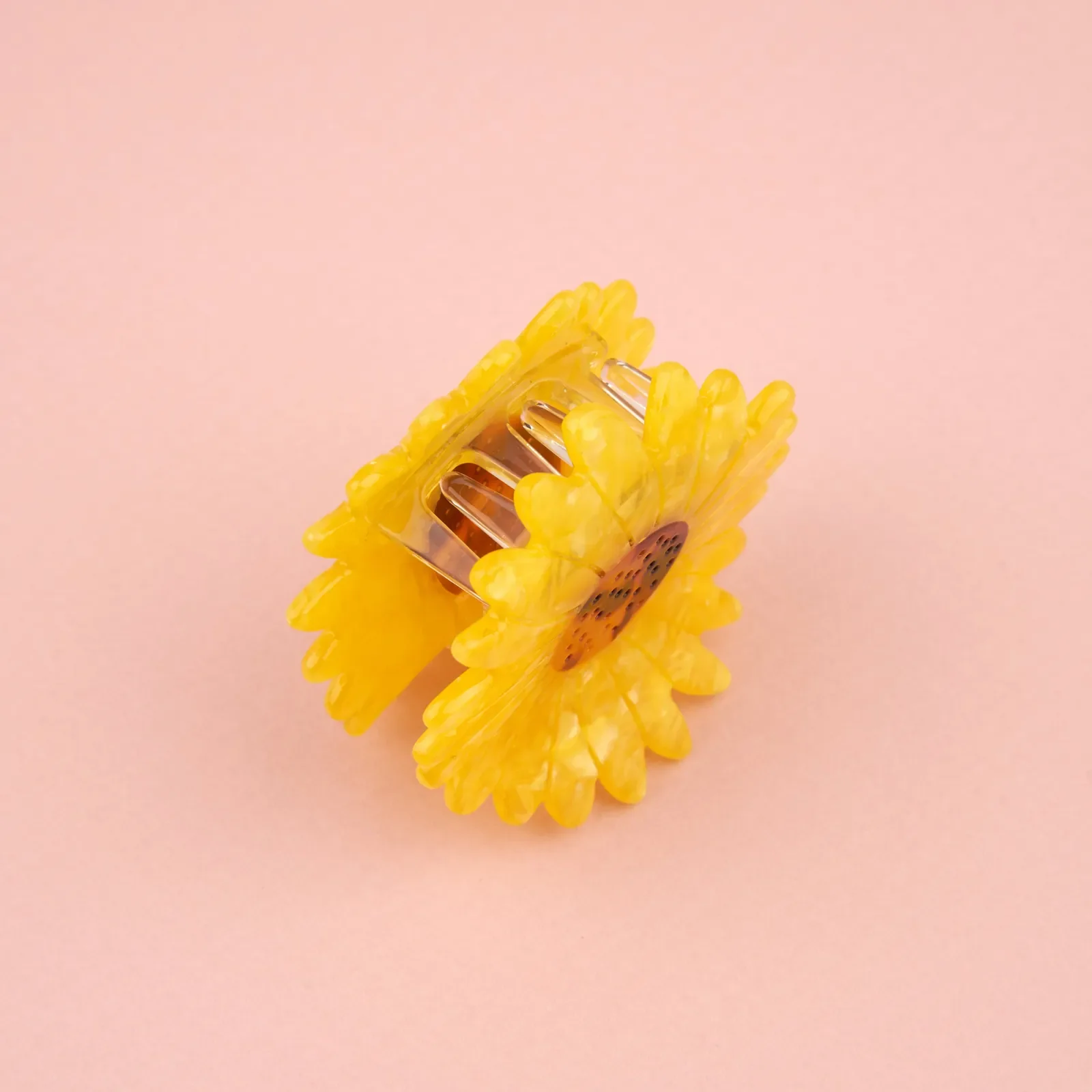 Coucou Suzette Sunflower Hair Claw in glossy cellulose acetate, a bright French flower hair accessory curated by Goosebump.