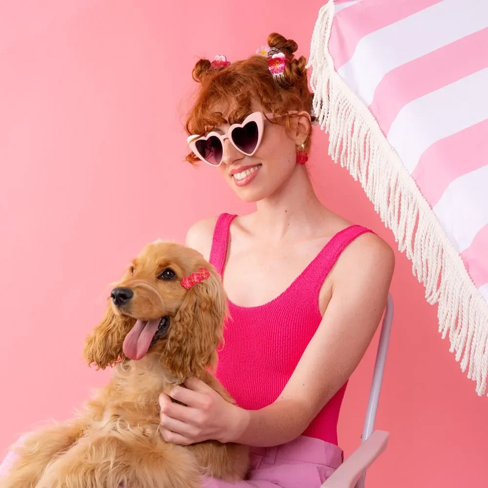 Coucou Suzette Mini Hibiscus Hair Claw in acrylic, a cheerful French flower hair accessory curated by Goosebump.