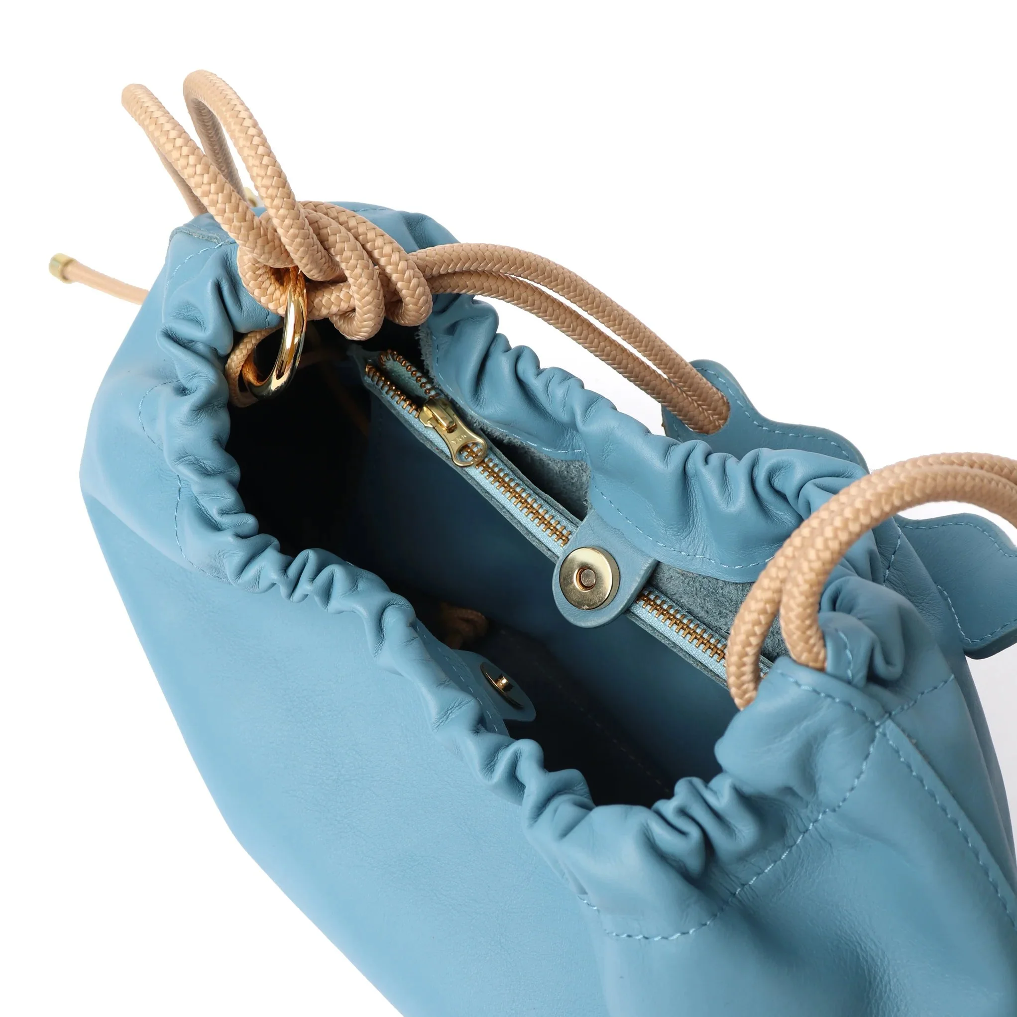 Sky Blue leather Flora Bag with tulip-inspired shape and artisan rope strap by Project Dyad, made in Cape Town.