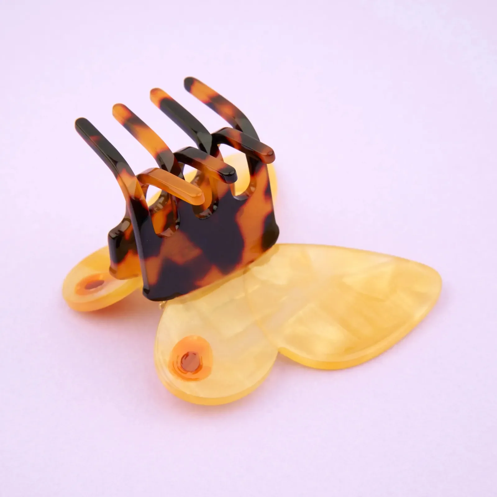 Coucou Suzette Yellow Butterfly Hair Claw in glossy cellulose acetate, a cheerful nature-inspired French hair accessory curated by Goosebump.