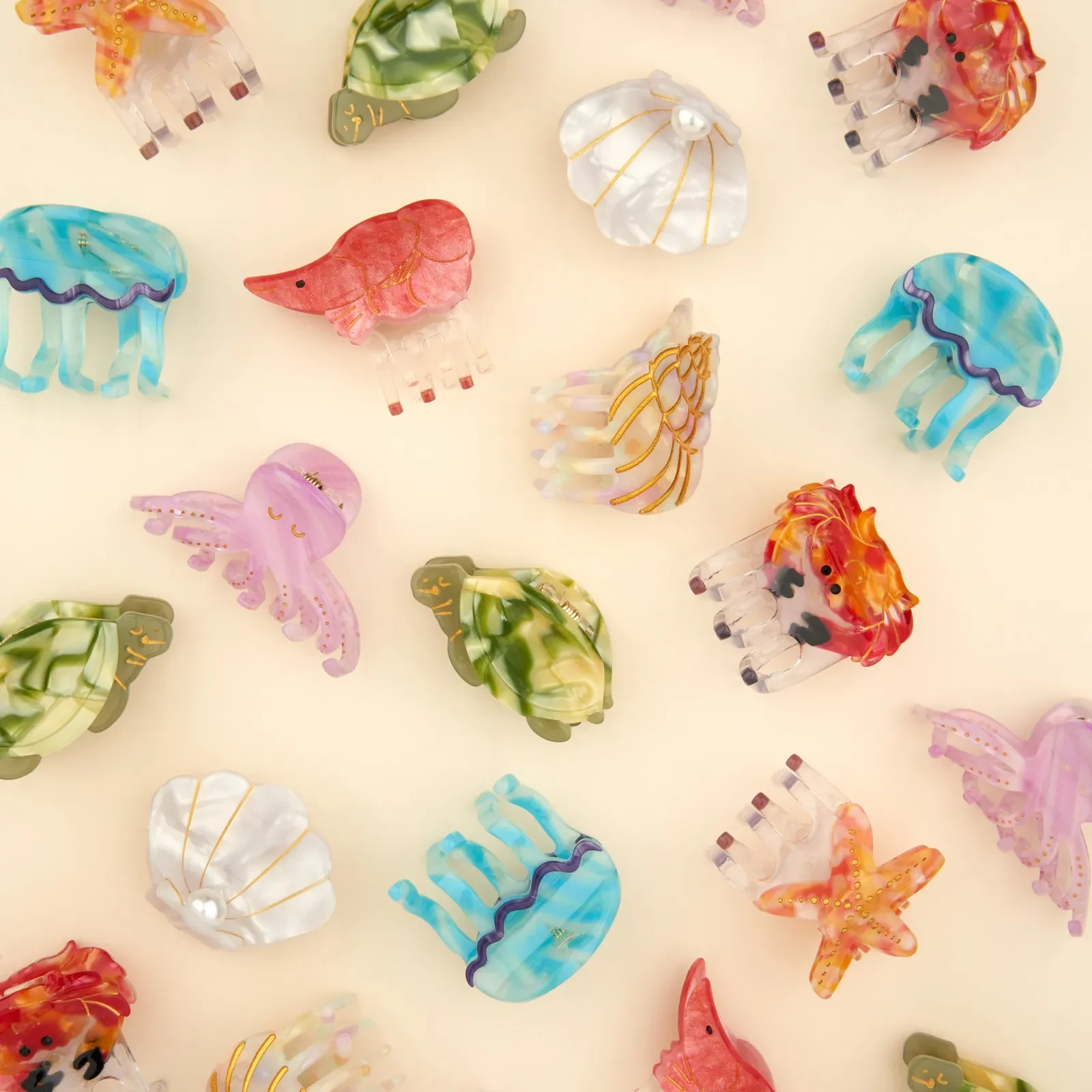 Coucou Suzette Mini Shrimp Hair Claw in glossy cellulose acetate, a quirky sea-inspired French hair accessory curated by Goosebump.