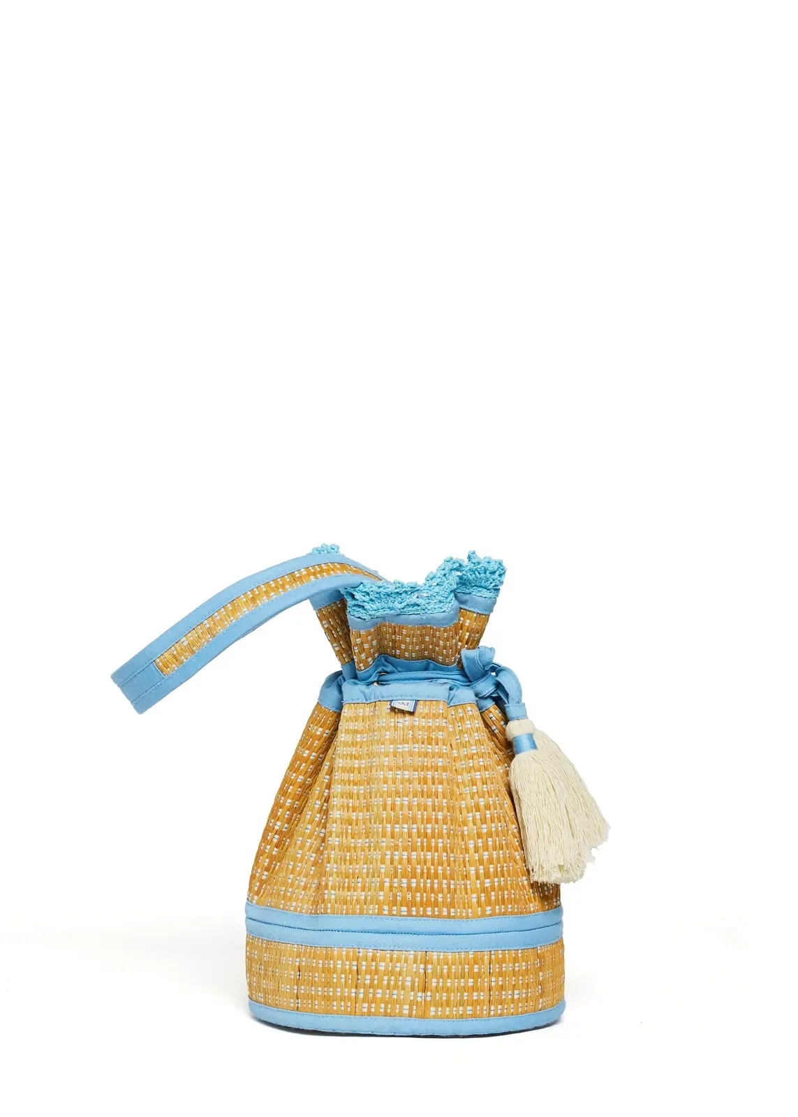 Side profile of the Lorna Murray Sea Scape Garden Mini Leisure Tote highlighting its compact woven silhouette.