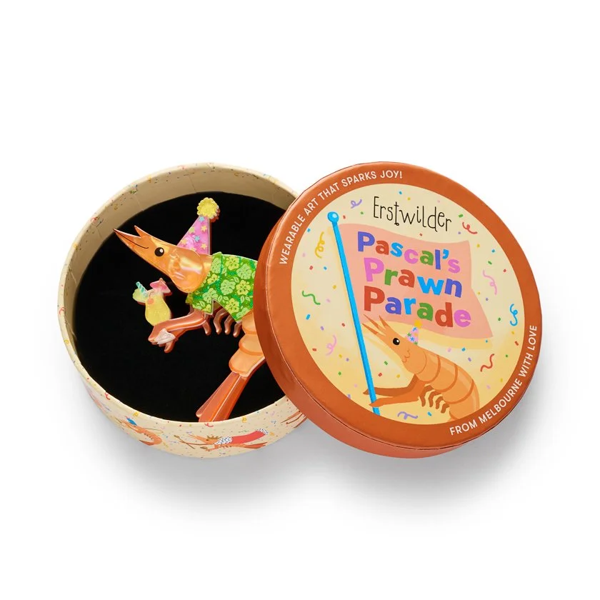 Erstwilder Pascal the Party Prawn Brooch featuring Pascal dressed for a party with a colourful hat and drink