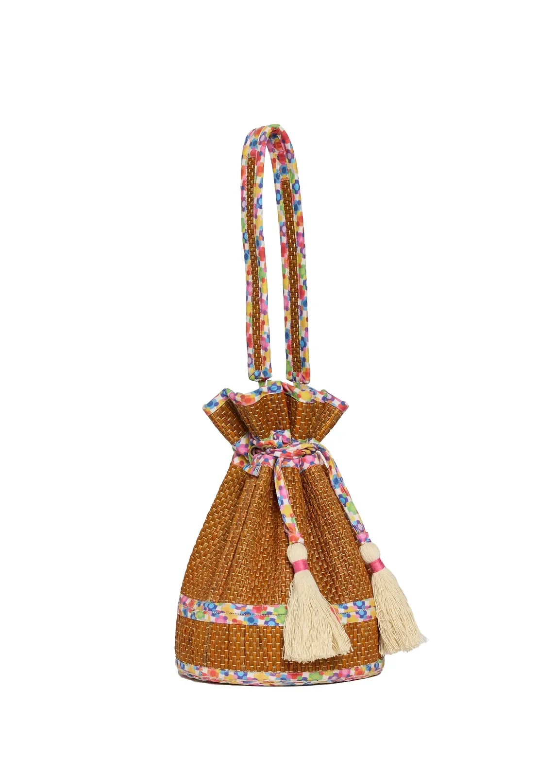 Side profile of the Lorna Murray Sun Speckles Afternoon Mini Leisure Tote showcasing its handcrafted woven silhouette.