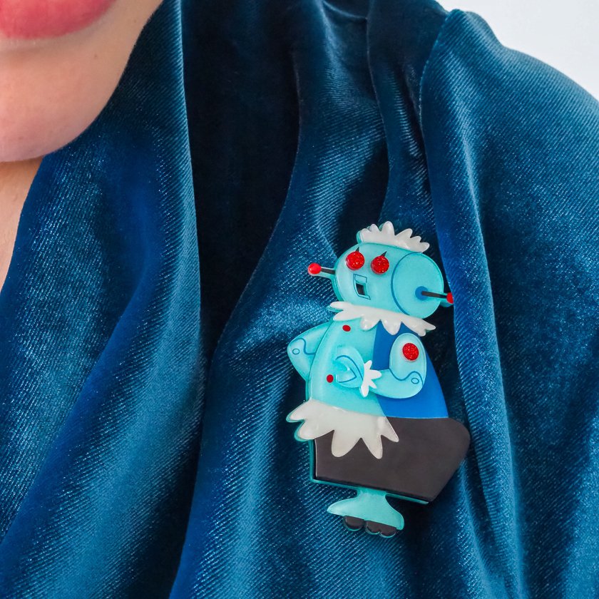Rosie the Robot brooch by Erstwilder, featuring a retro futuristic robot design in layered resin, inspired by The Jetsons cartoon.