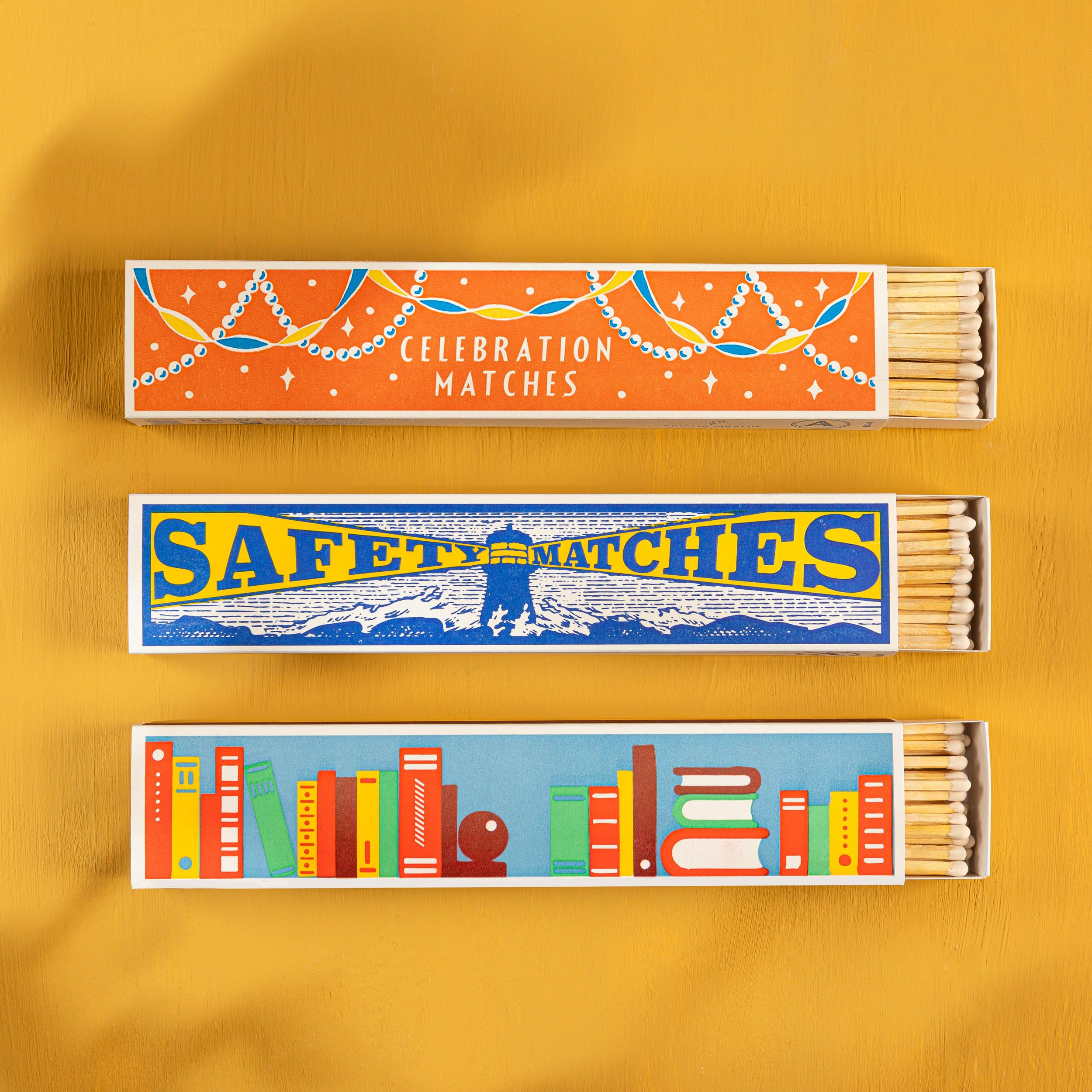 Celebration Matches by Ariana Martin, long matches for easy reach to the bottom of candle jars, available at Goosebump.live.