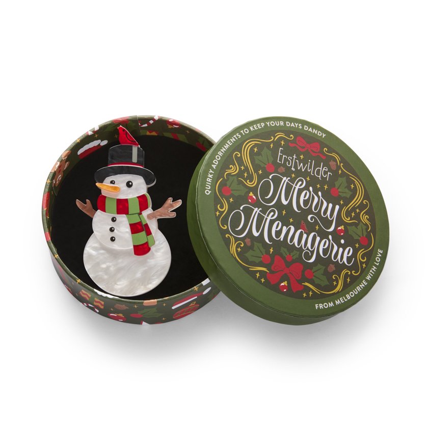 Erstwilder Frosty Fellow snowman brooch with striped scarf and red bird on hat. Festive resin design, limited release, exclusive in Hong Kong at Goosebump.