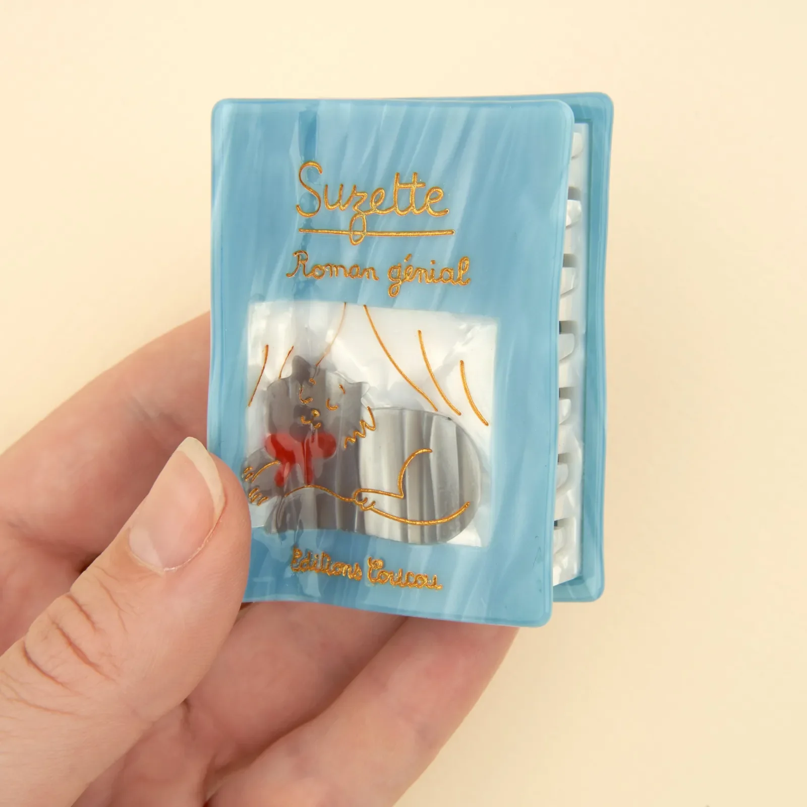 Coucou Suzette Novel Hair Claw in glossy cellulose acetate, a witty book-inspired French hair accessory curated by Goosebump.