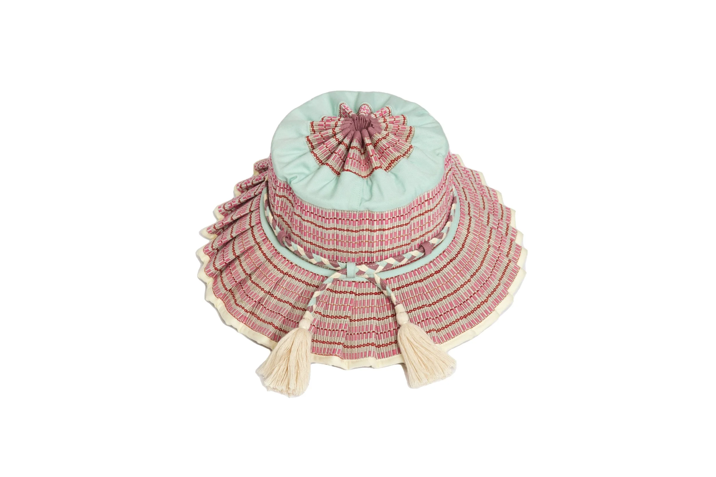 Back view of the Lorna Murray Procida Island Florence Hat featuring braided ties, tassels and handcrafted natural grass fibre weaving.
