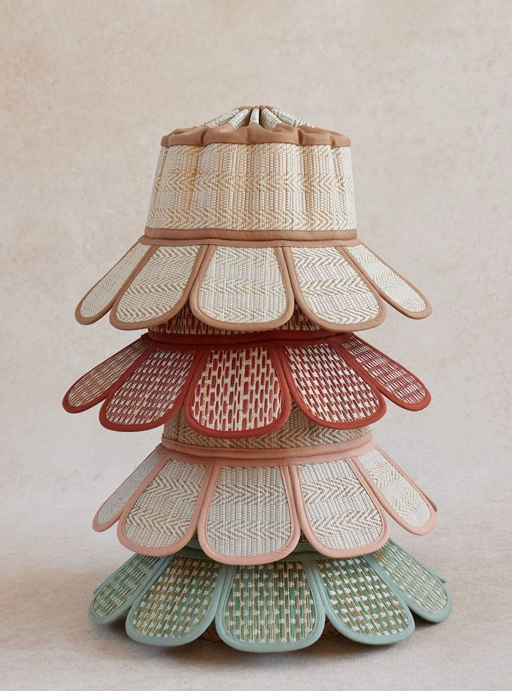 Nomad Island Capri Hat – handwoven palm leaf foldable sun hat with wide brim in neutral tones, available at Goosebump Hong Kong.