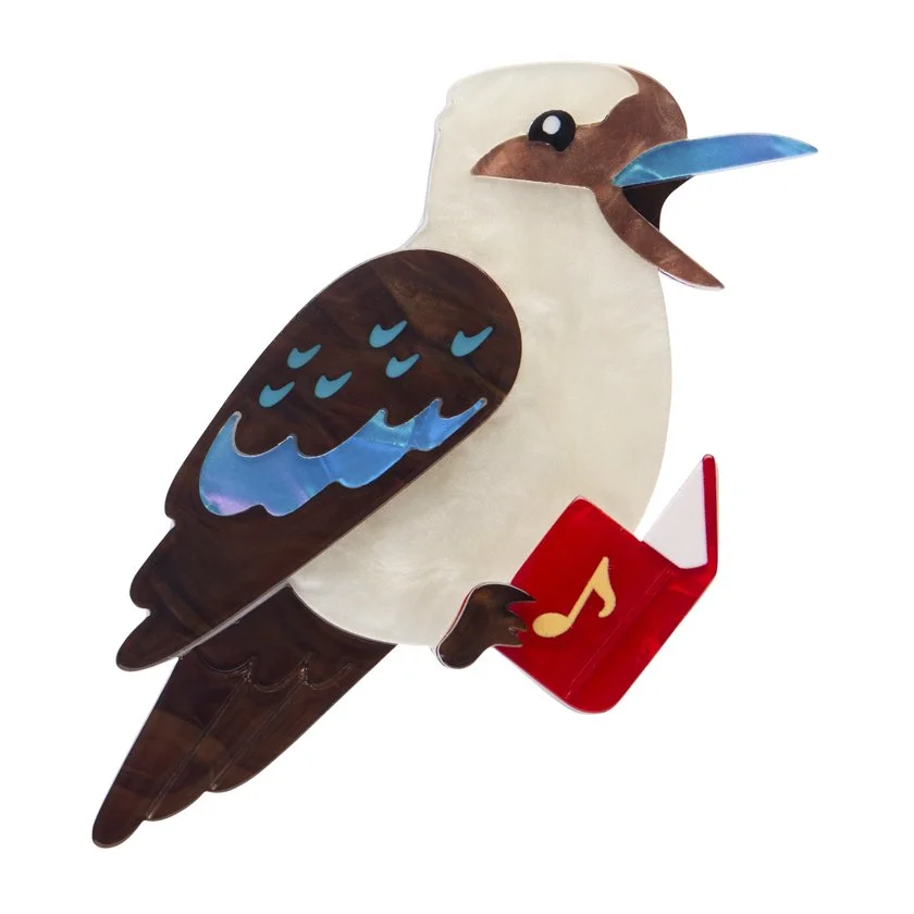 Erstwilder Kip the Kookaburra Christmas brooch singing with carol book, handcrafted layered resin design. Exclusive in Hong Kong at Goosebump.