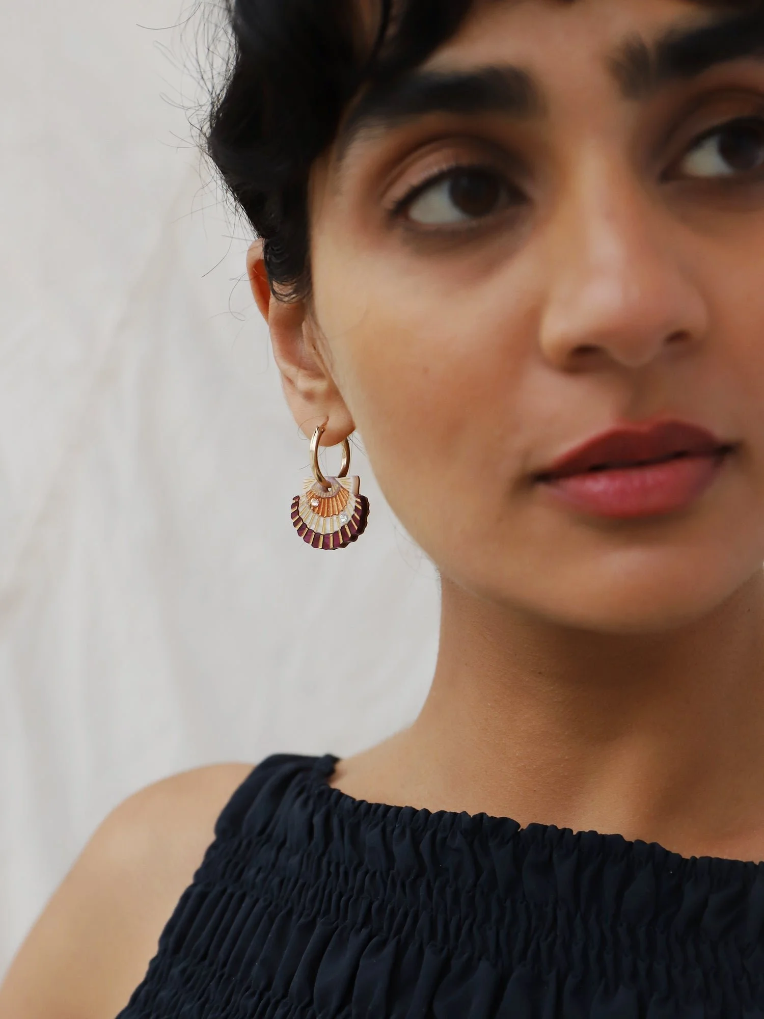 Wolf & Moon Scallop Shell Hoops with peach and cream scallop shell charms, acrylic and wood construction, glass crystal details and gold-filled hoops.